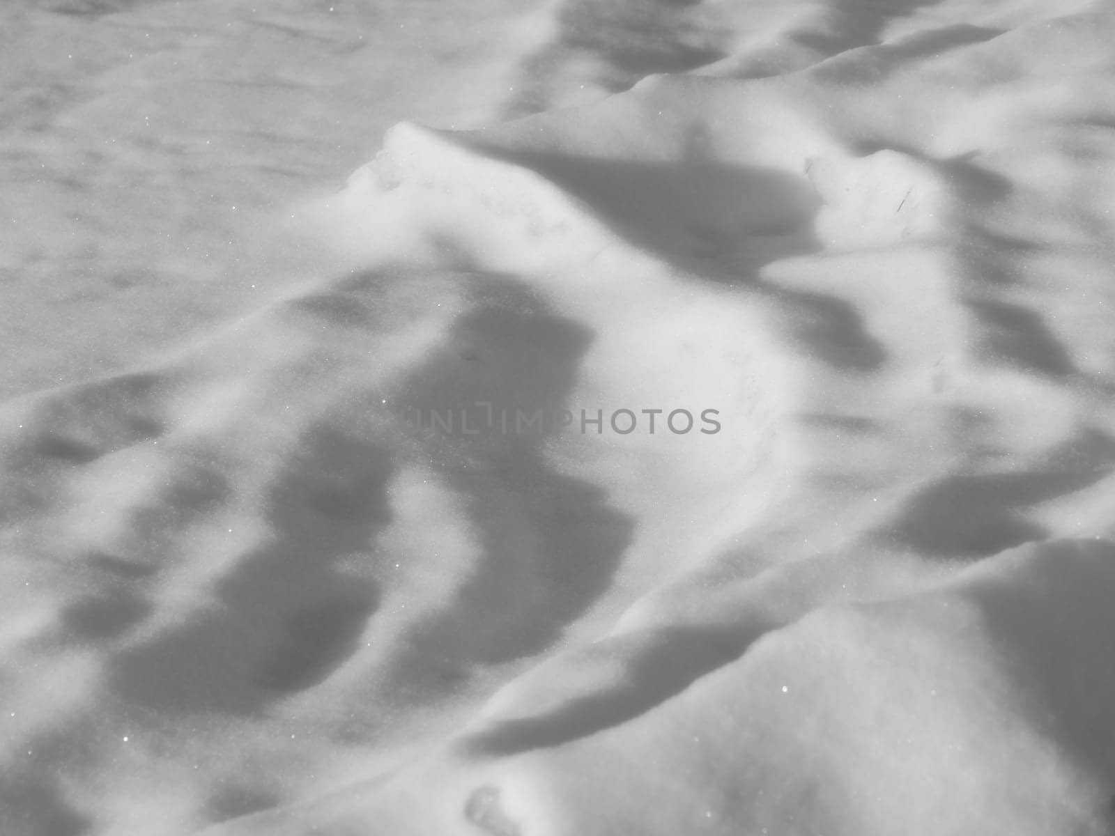 drifts of white snow light and shadow background