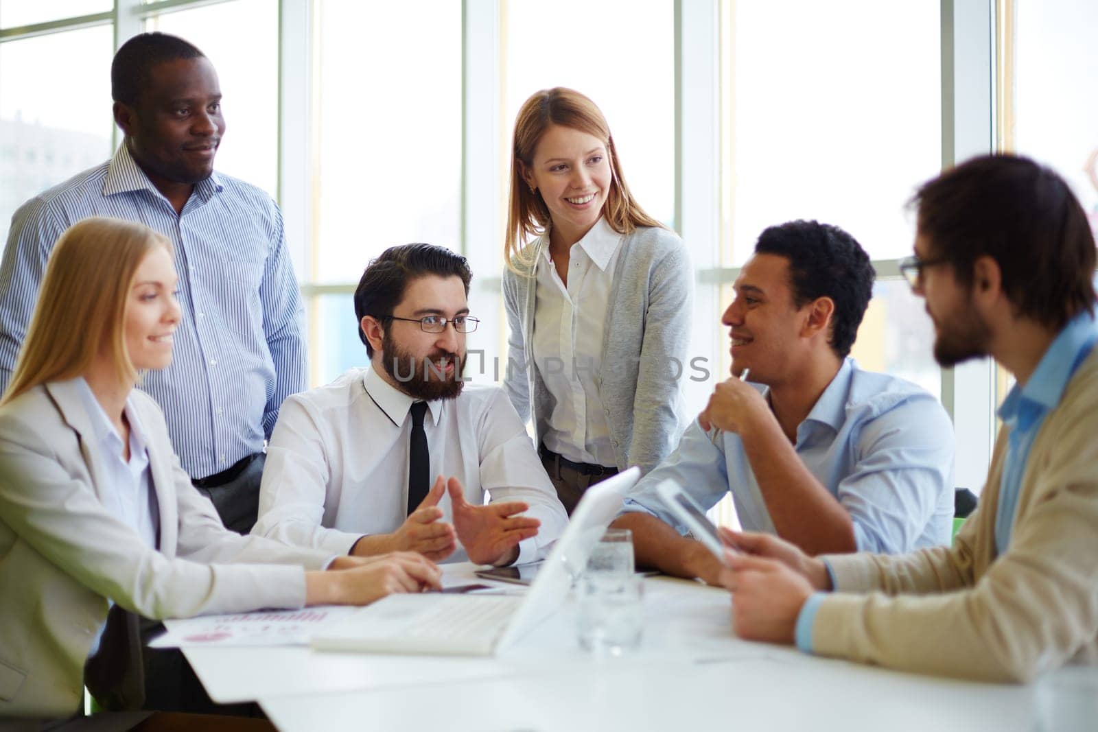 Chief gathering his workers in boardroom