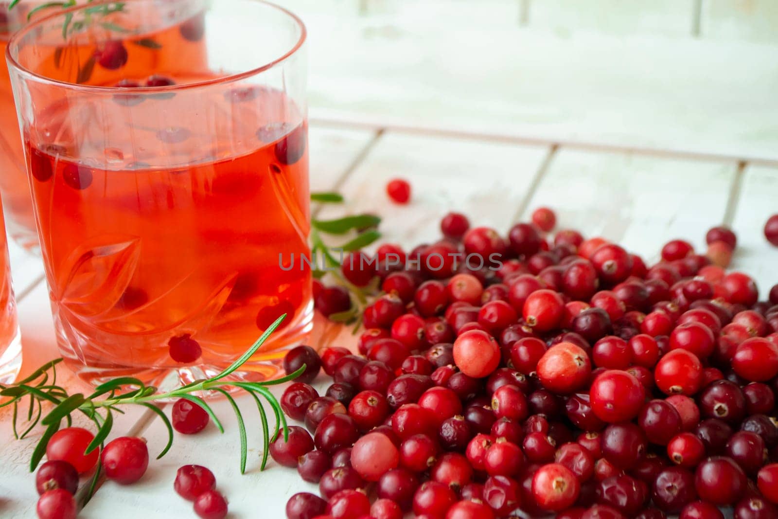 Ripe cranberries in a glass. Berry healthy compote, close up