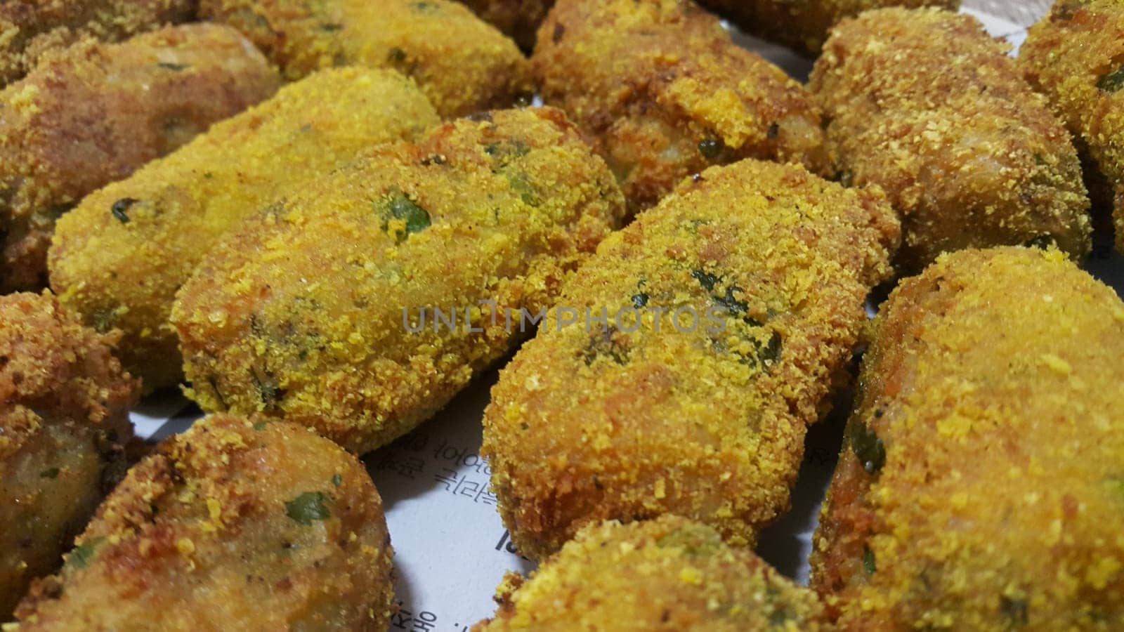 Closeup perspective view of home made spicy and delicious croquettes served with tea or other dishes during parties as fast food.