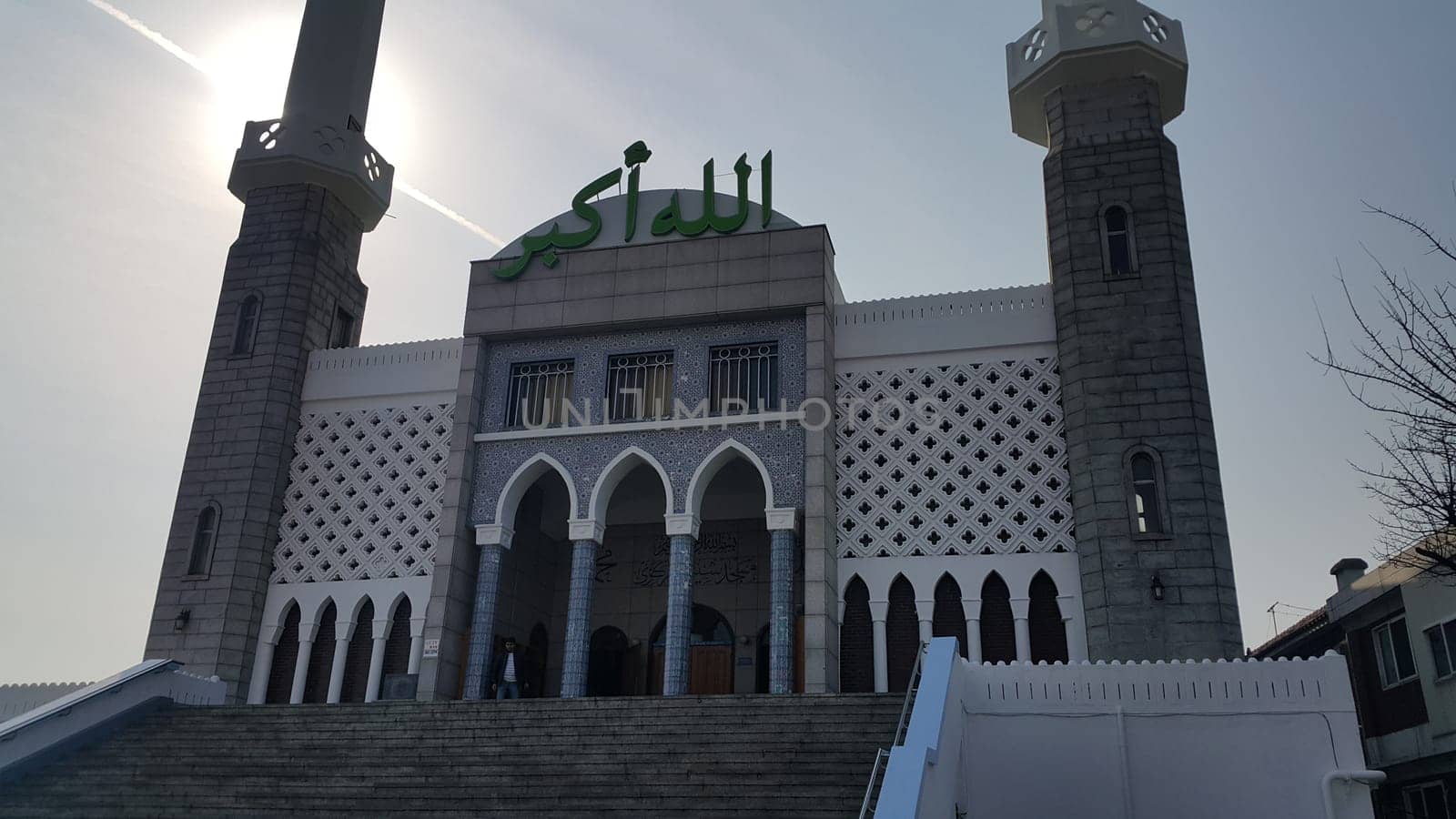 Seoul, South Korea - February 12, 2019:  Seoul Central Mosque, the first and biggest Islamic mosque in South Korea located in Itaewon Dong area. It has minerates and Letters with Allahu Akbar which means "Allah is the greatest""."