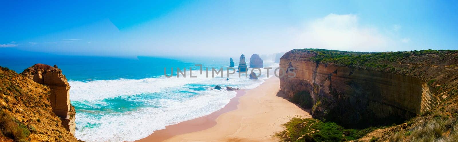 The Twelve Apostles, a famous collection of limestone stacks off the shore of the Port Campbell National Park, by the Great Ocean Road in Victoria, Australia.