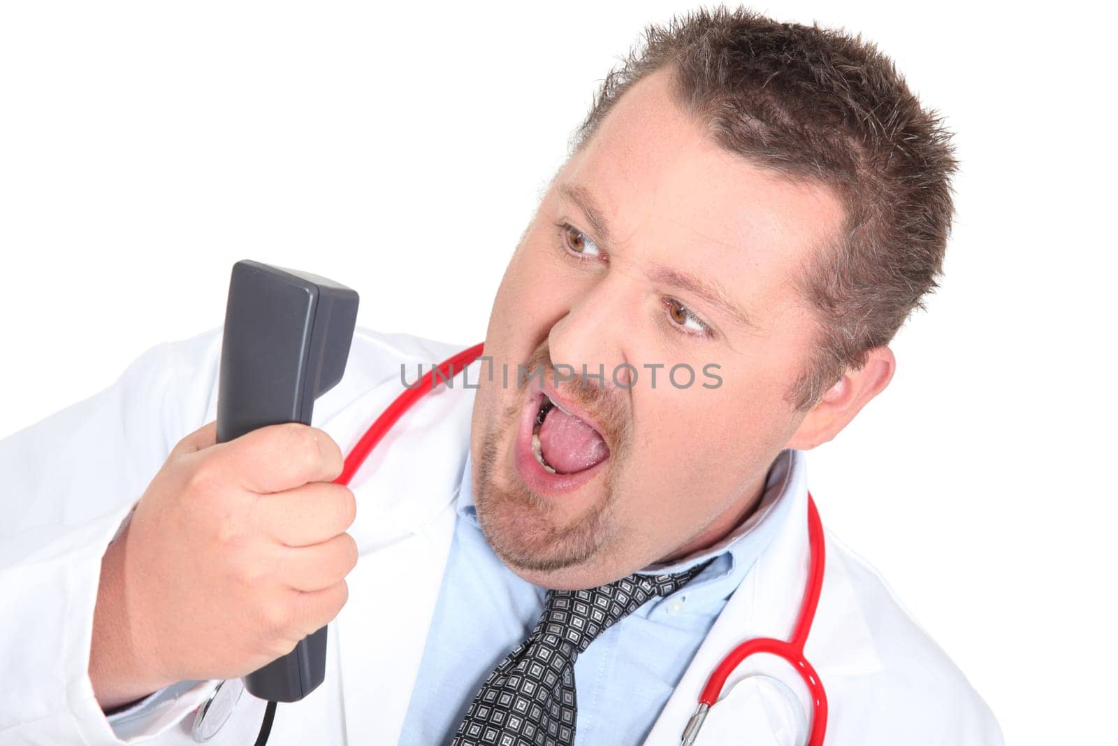 Doctor shouting down the telephone
