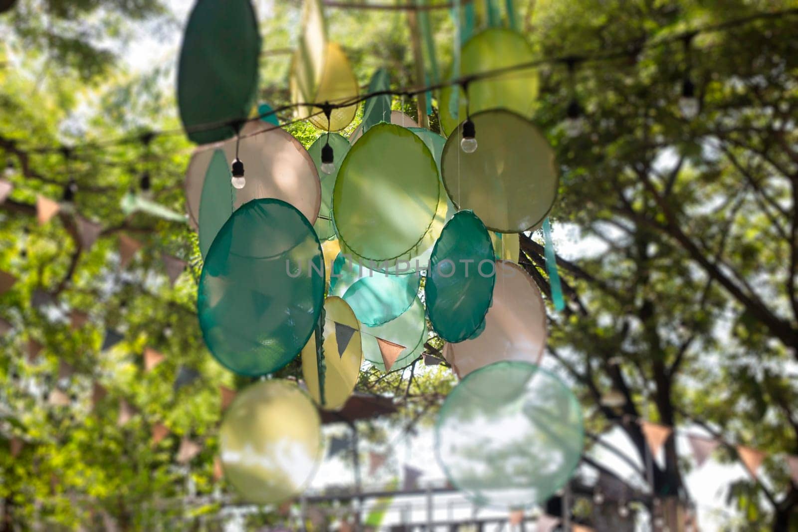 Hanging colorful fabric decorated in the garden, stock photo