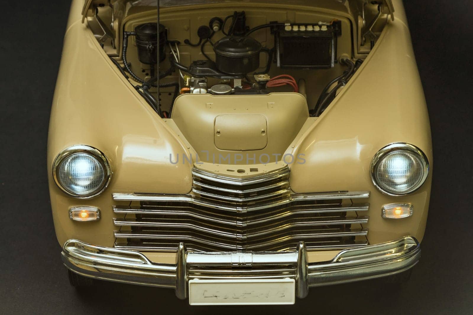 engine bay view under the raised hood of a retro car Gaz M-20