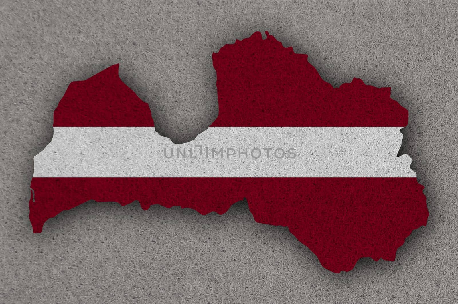 Map and flag of Latvia on felt