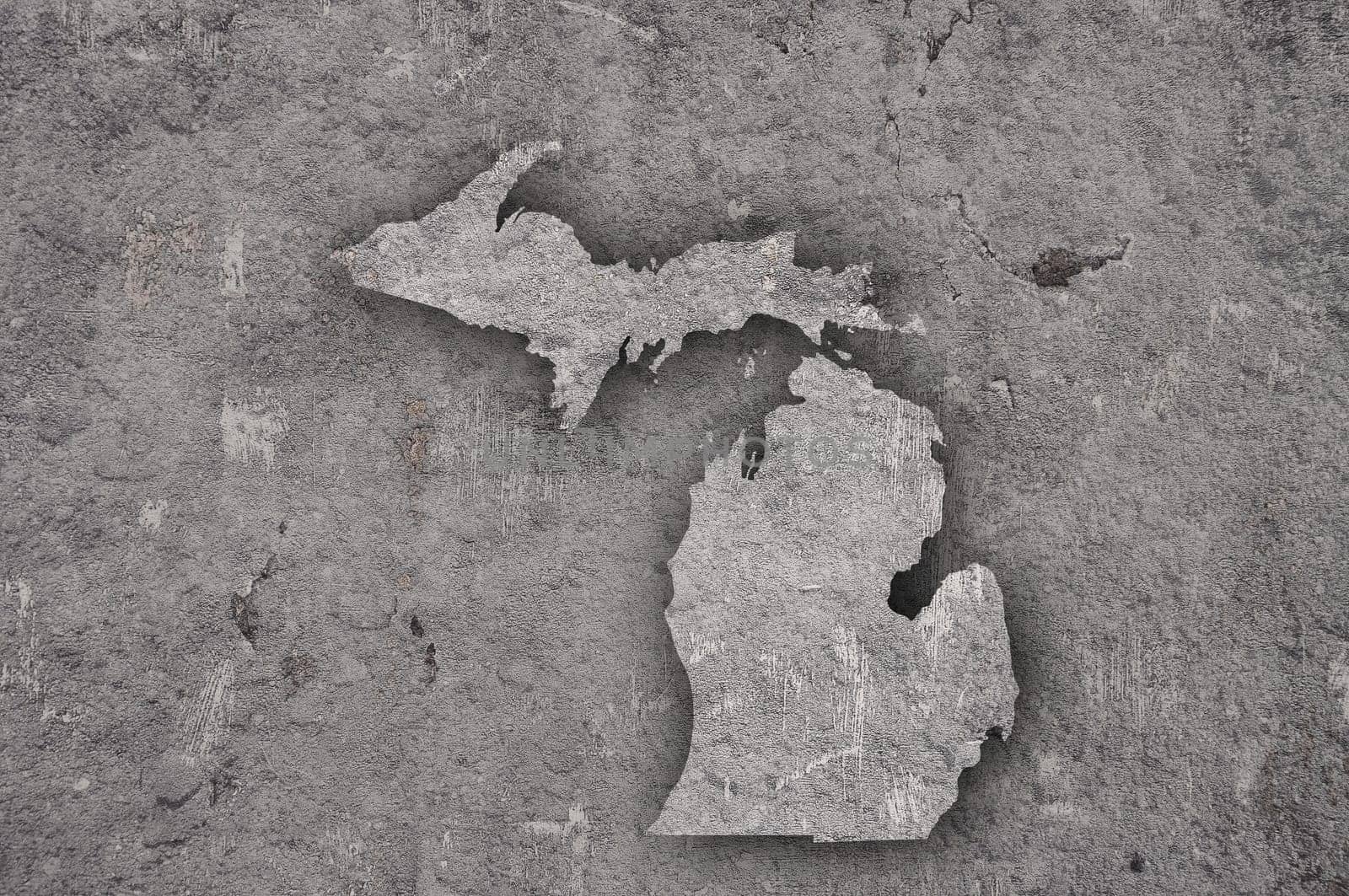 Map of Michigan on weathered concrete