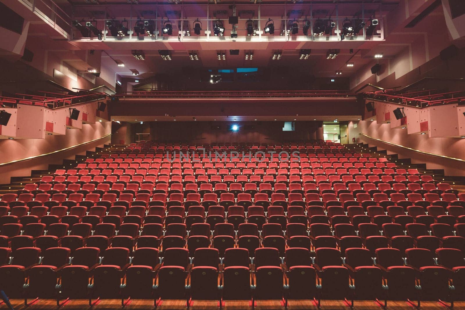 Interior of modern empty red congress hall.