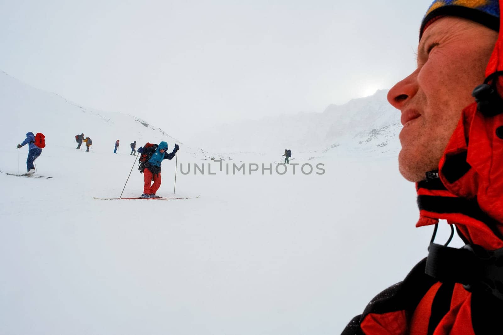 Tankhoy, Russia - January 20, 2019: Skiers ride in the snow in the mountains of Baikal