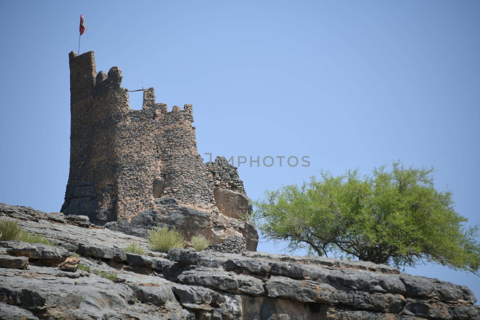 A ruin in the oasis of the mountain village Misfah in Oman where the famous Falaj irrigation system can be seen.
