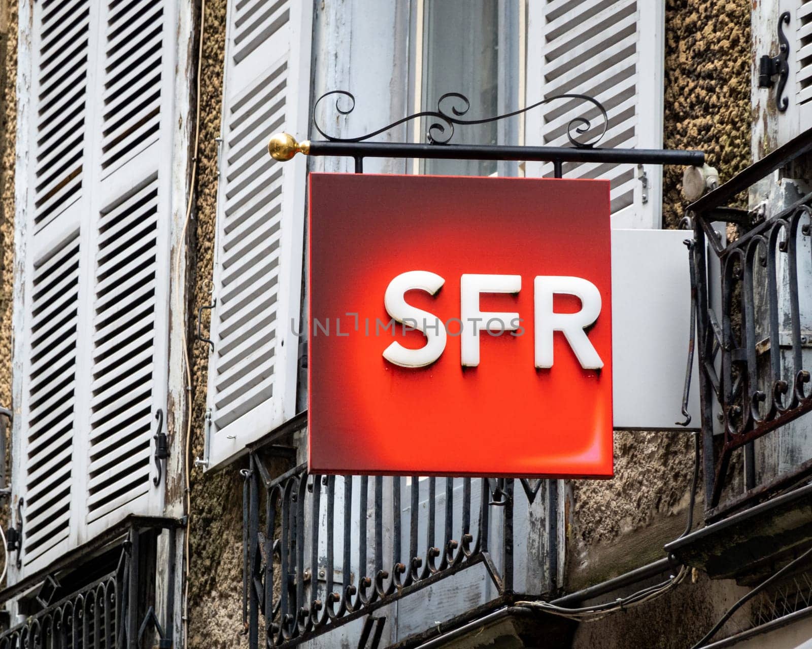 BAYONNE, FRANCE - CIRCA DECEMBER 2020: SFR shop sign in the town center. SFR is a French telecom company.