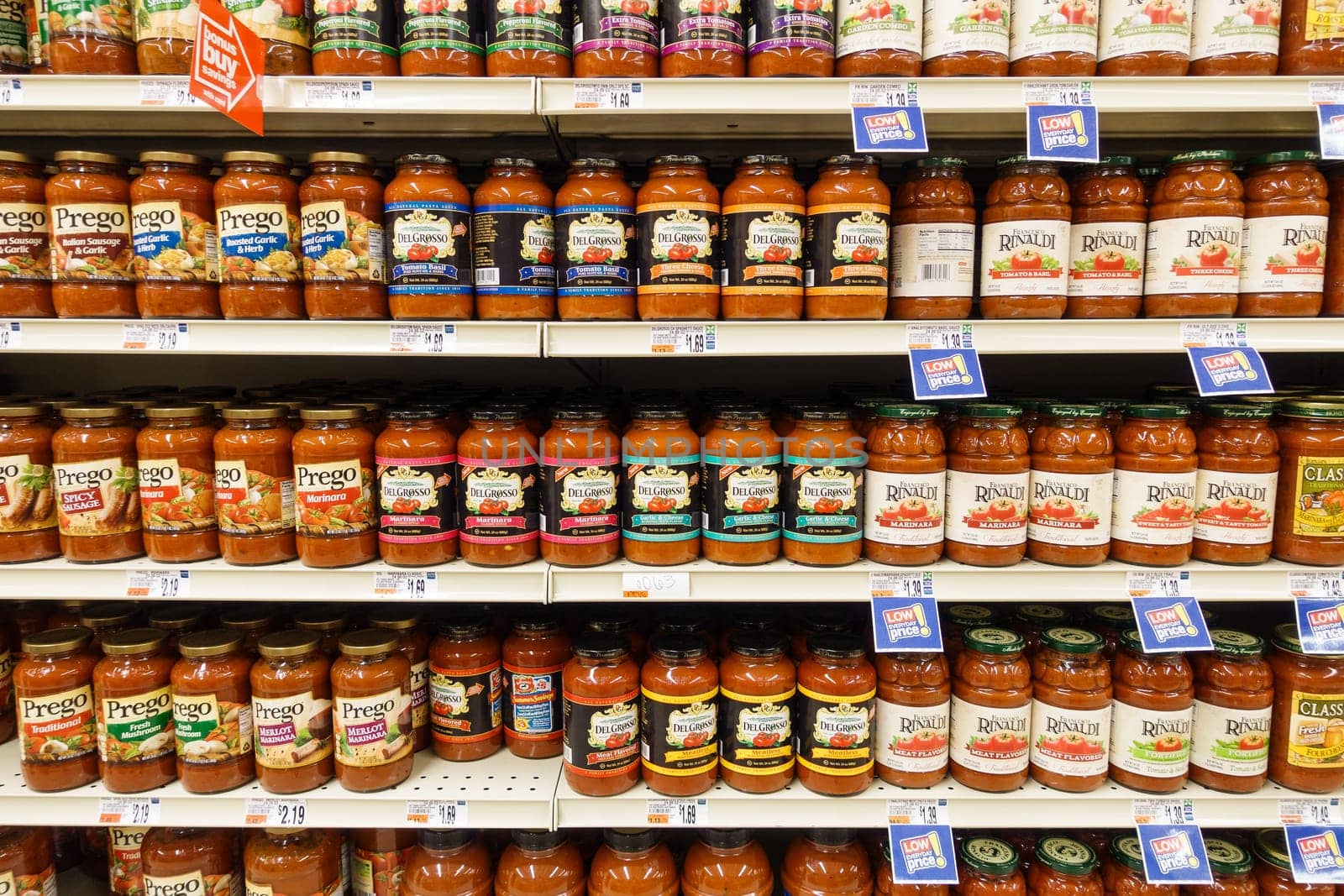 WILLIAMSBURG, VA, USA - CIRCA AUGUST 2015: Tomato sauce jars on supermarket shelves.