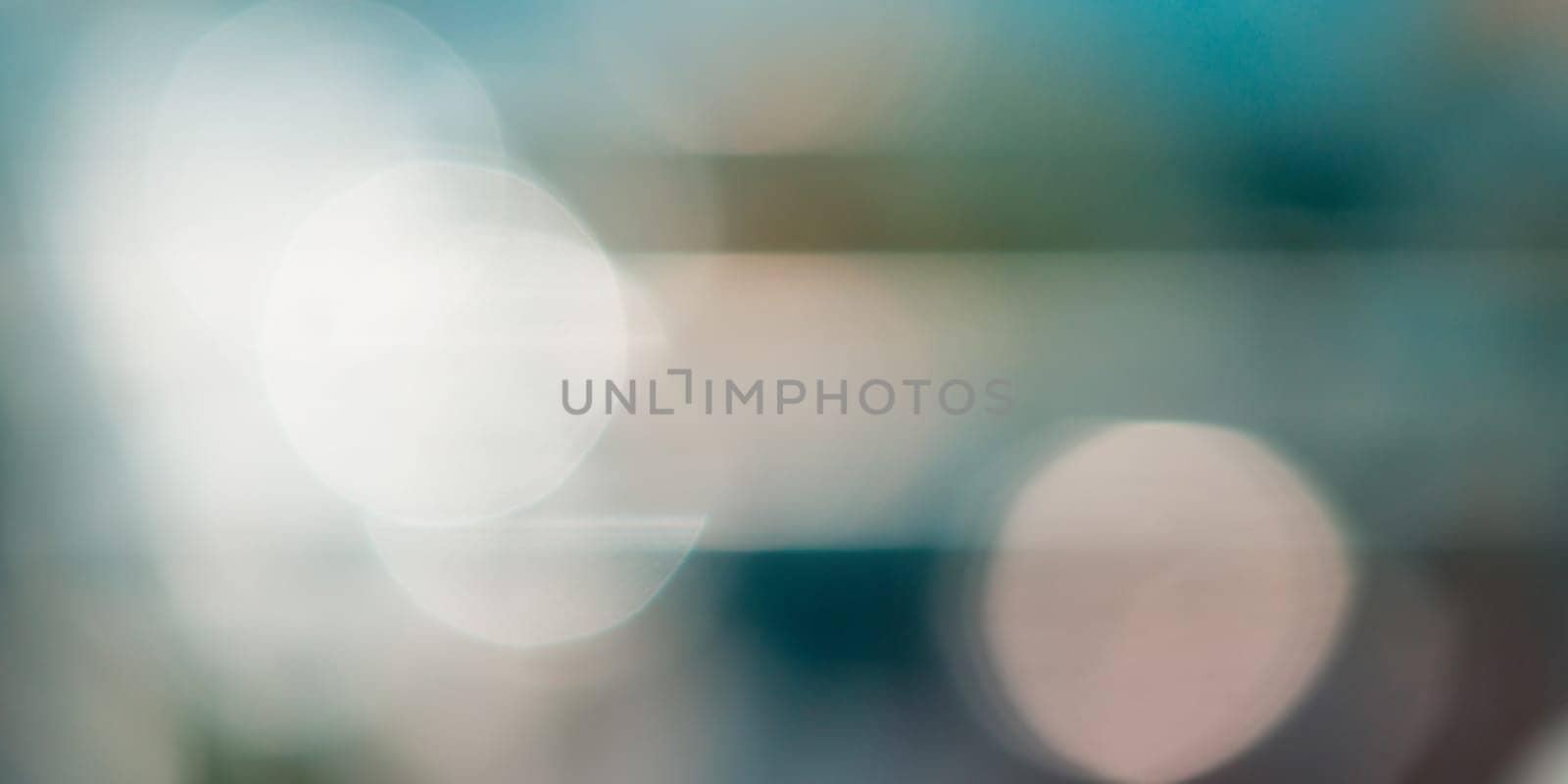 Abstract cinematic bokeh background, defocused light spots