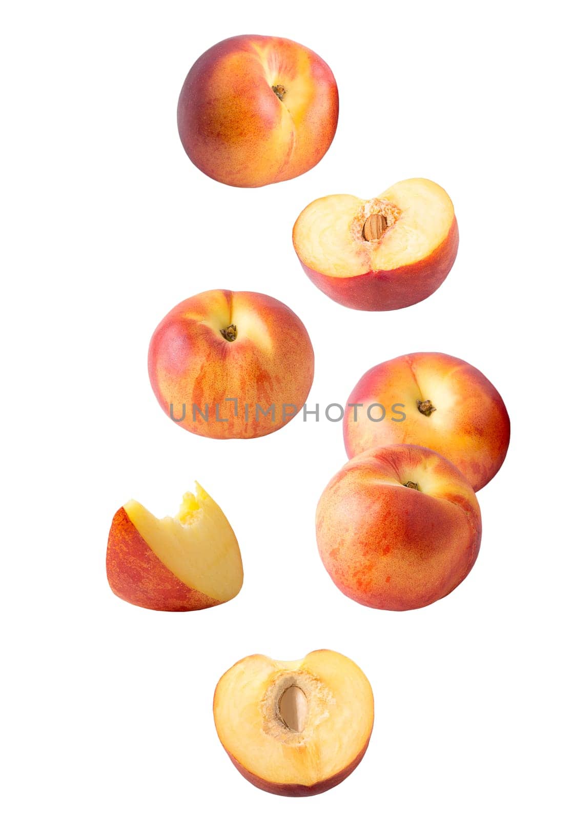 Flying fruits. Seven pieces of falling peach fruit isolated on withe background with clipping path as package design element and advertising. Full depth of field.