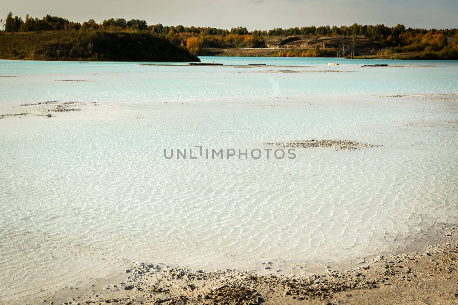 The water in the ash dump seems as beautiful as on postcards from distant seaside resorts.