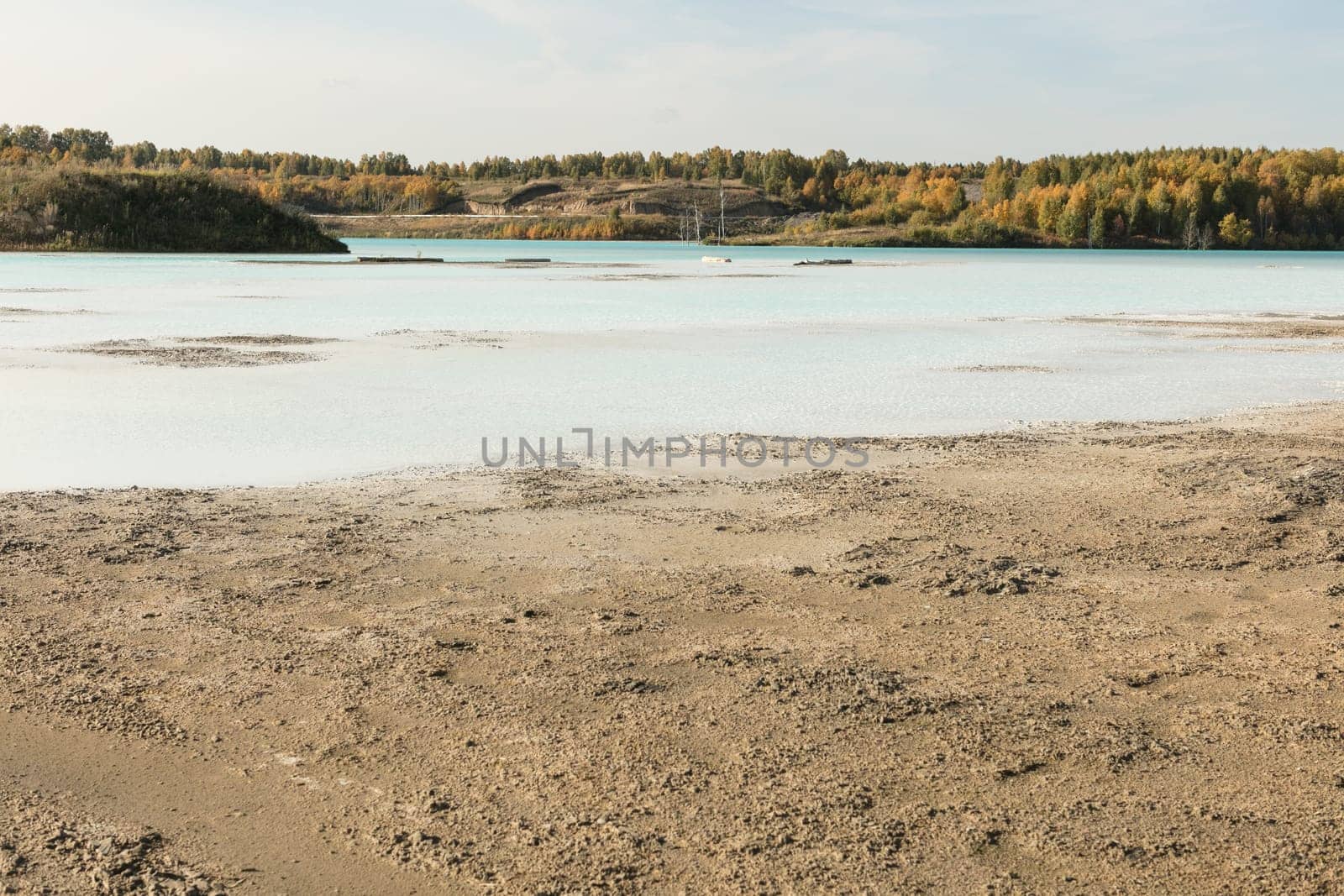 The water in the ash dump seems as beautiful as on postcards from distant seaside resorts.