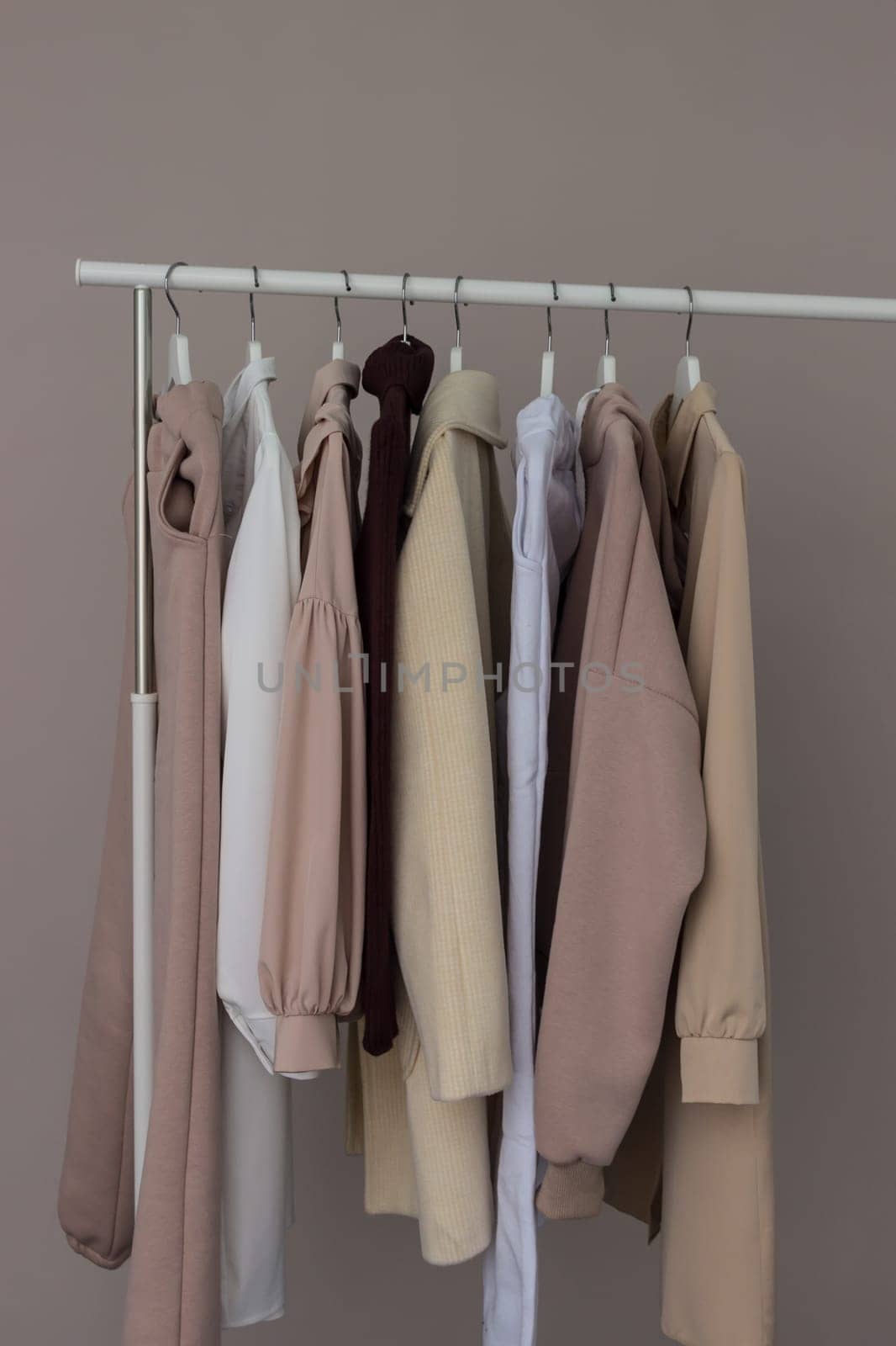 Women's casual clothing on an open hanger.