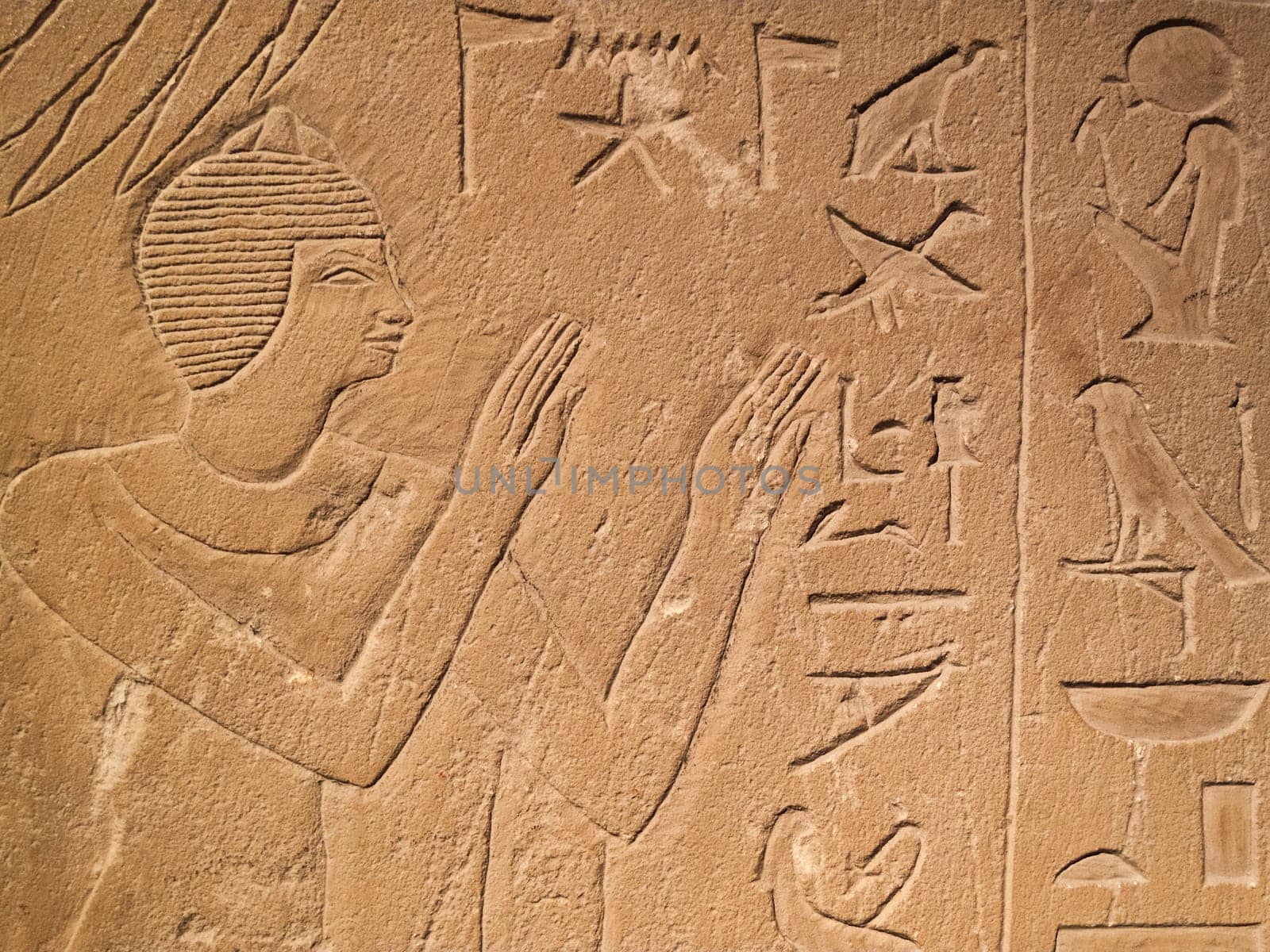 Ancient Egypt tomb hieroglyphs stone wall background