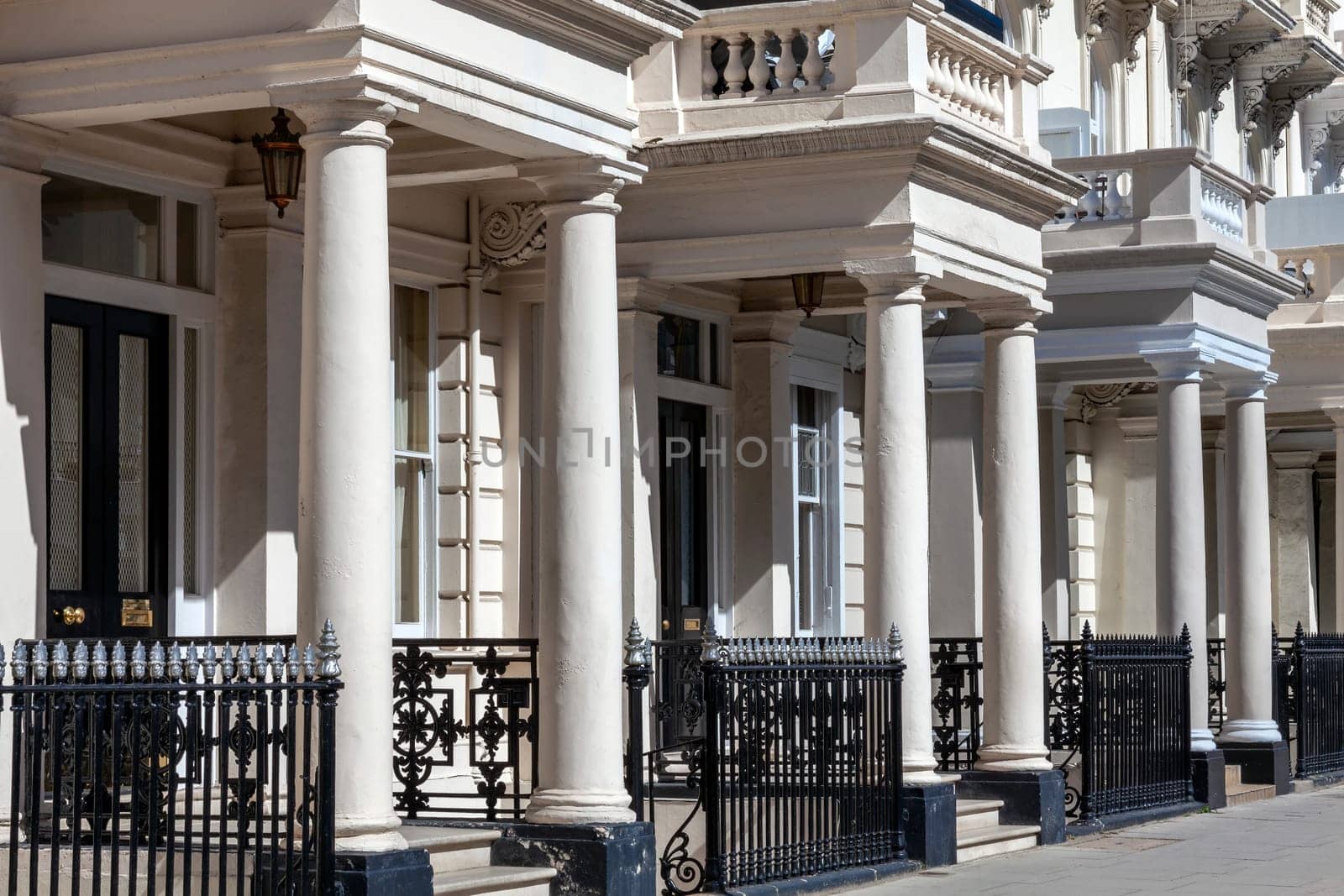 Regency Georgian terraced town house homes and apartments in Kensington London England UK  which area popular travel destination tourist attraction landmark of the city, stock photo image