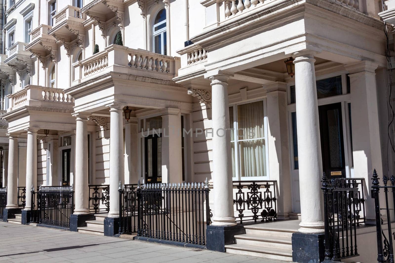Regency Georgian terraced town house homes and apartments in Kensington London England UK  which area popular travel destination tourist attraction landmark of the city, stock photo image