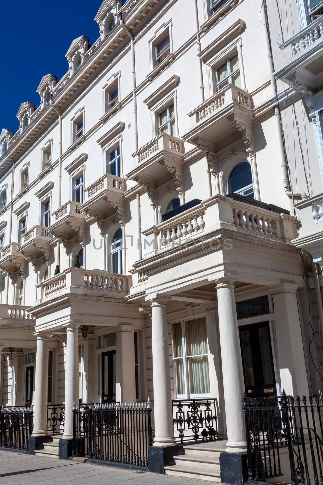 Regency Georgian terraced town house homes and apartments in Kensington London England UK  which area popular travel destination tourist attraction landmark of the city, stock photo image