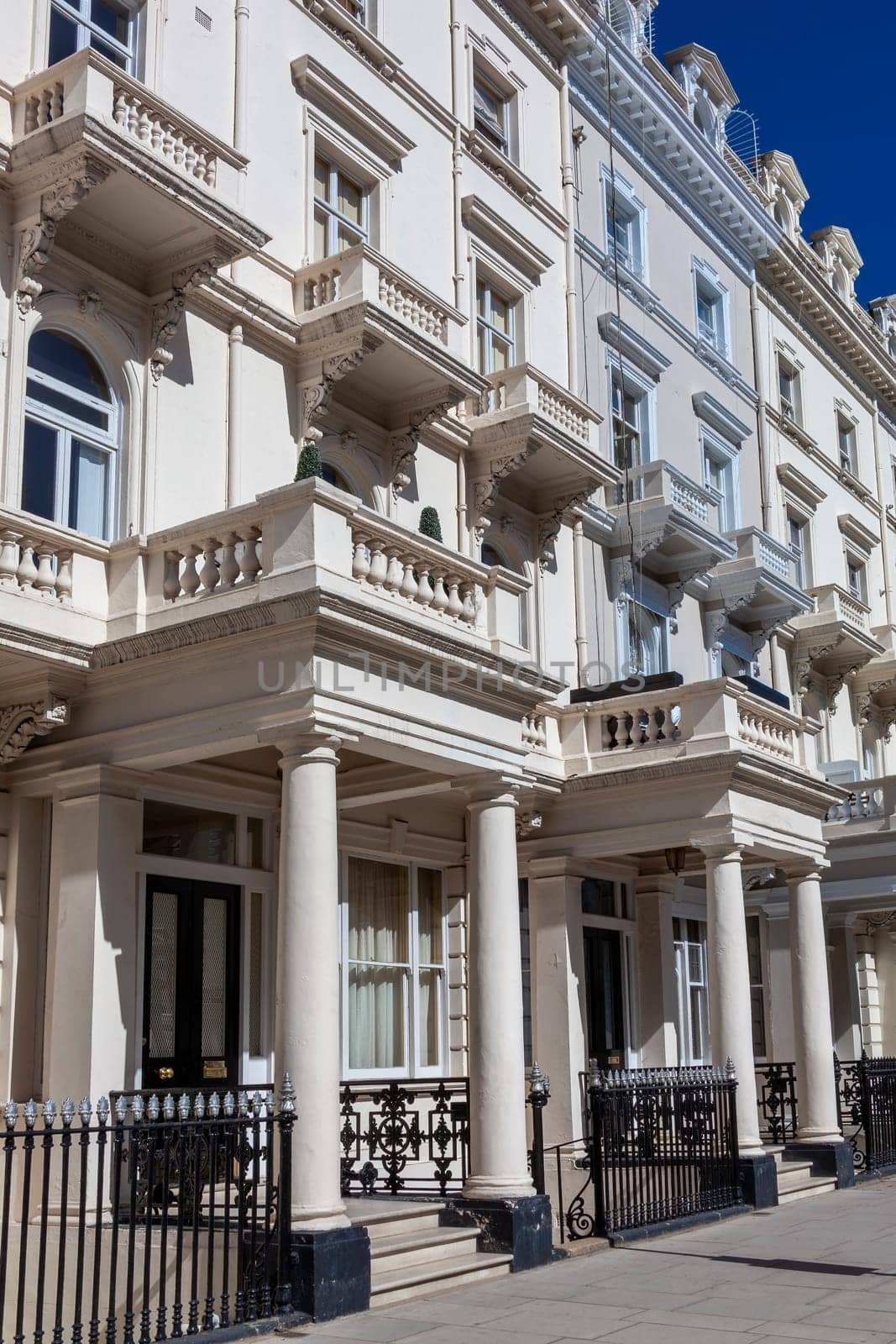 Regency Georgian terraced town house homes and apartments in Kensington London England UK  which area popular travel destination tourist attraction landmark of the city, stock photo image