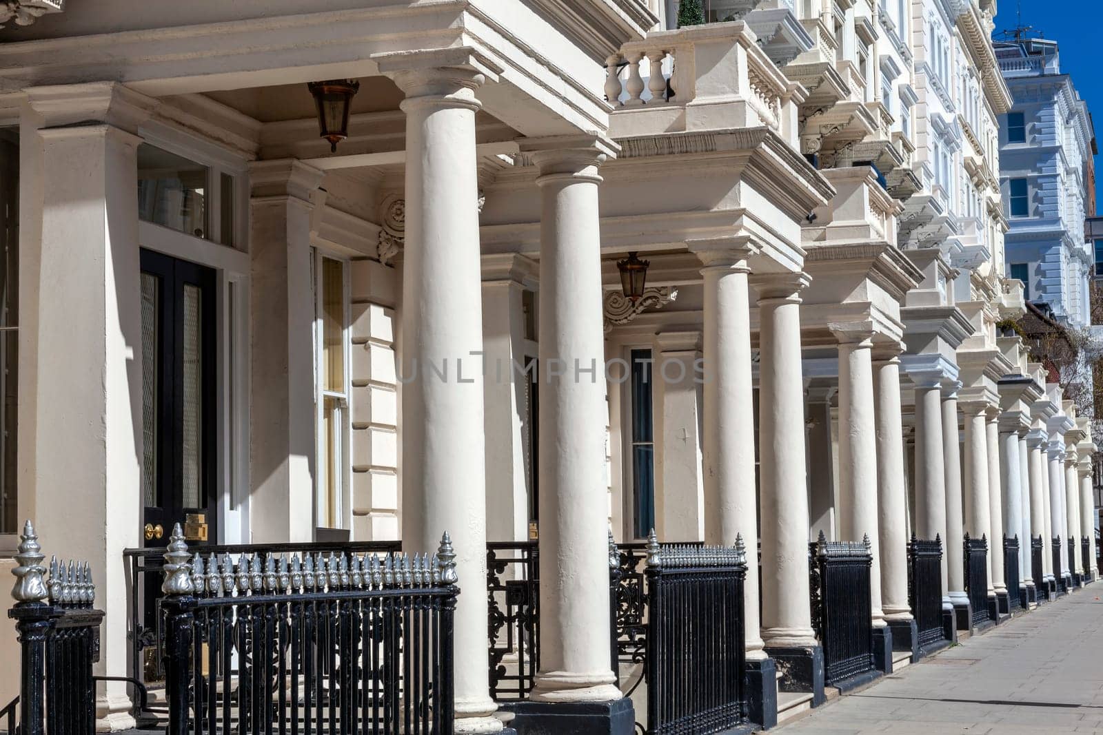 Regency Georgian terraced town house homes and apartments in Kensington London England UK  which area popular travel destination tourist attraction landmark of the city, stock photo image