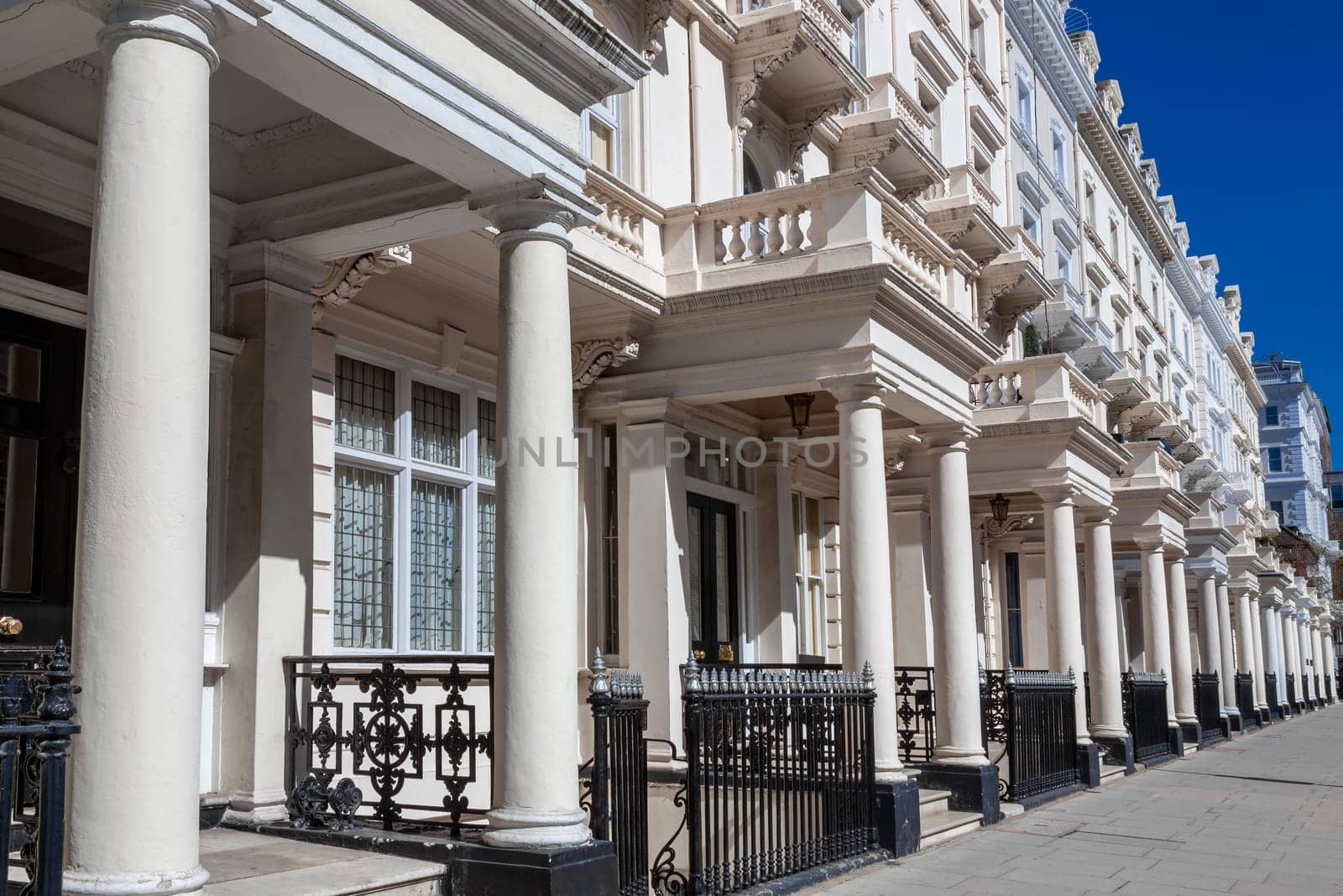 Regency Georgian terraced town house homes and apartments in Kensington London England UK  which area popular travel destination tourist attraction landmark of the city, stock photo image