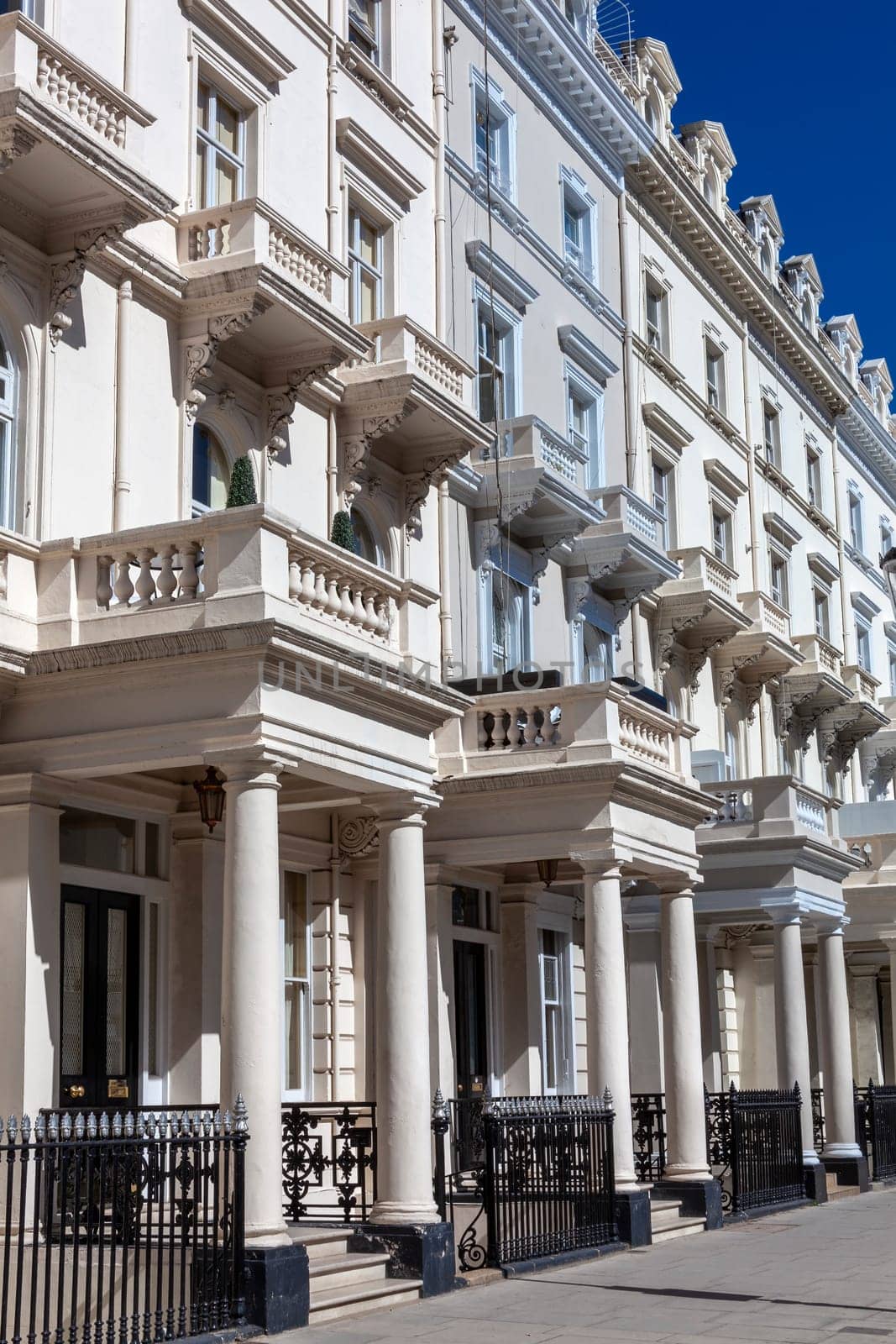Regency Georgian terraced town house homes and apartments in Kensington London England UK  which area popular travel destination tourist attraction landmark of the city, stock photo image