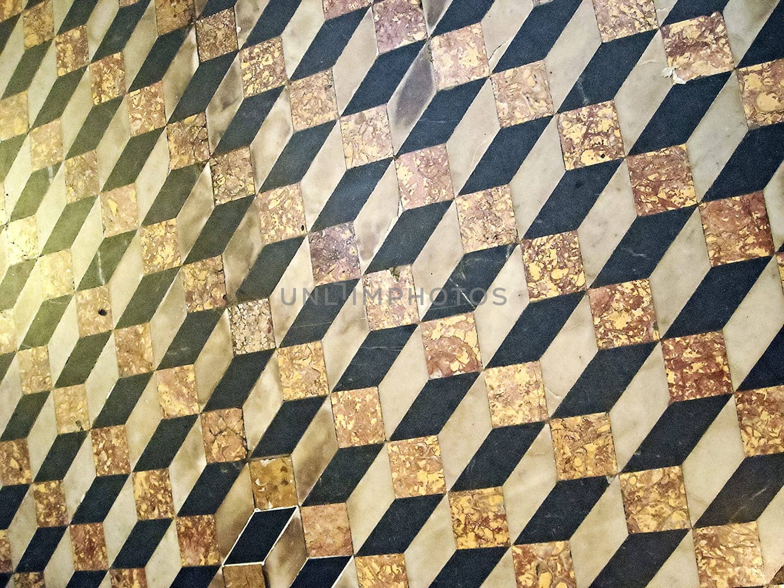 The pattern is black and white diamonds on the floor. marble tiles.