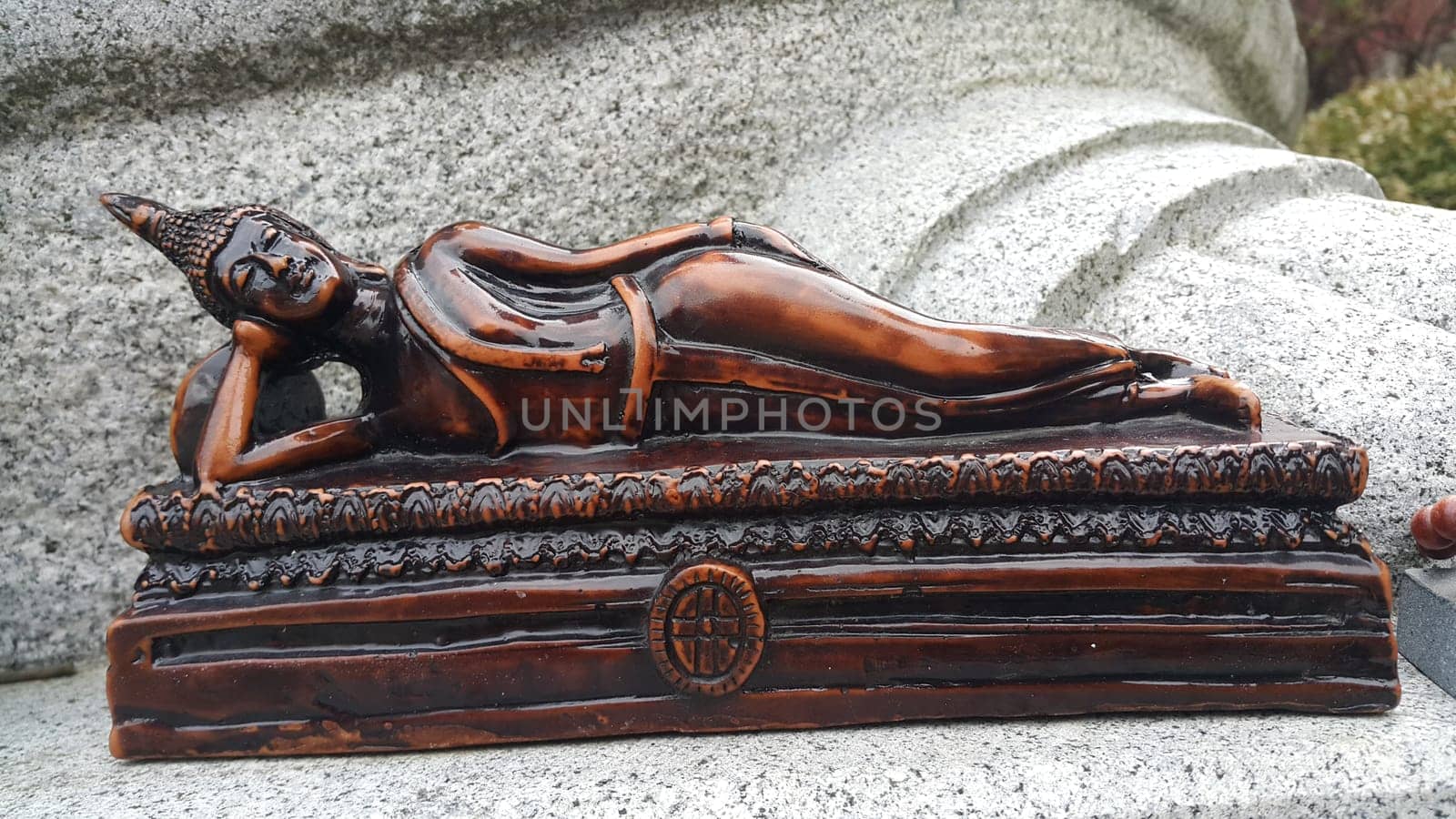 Closeup view of statues of religious monks. Buddha mini statue with beautiful background