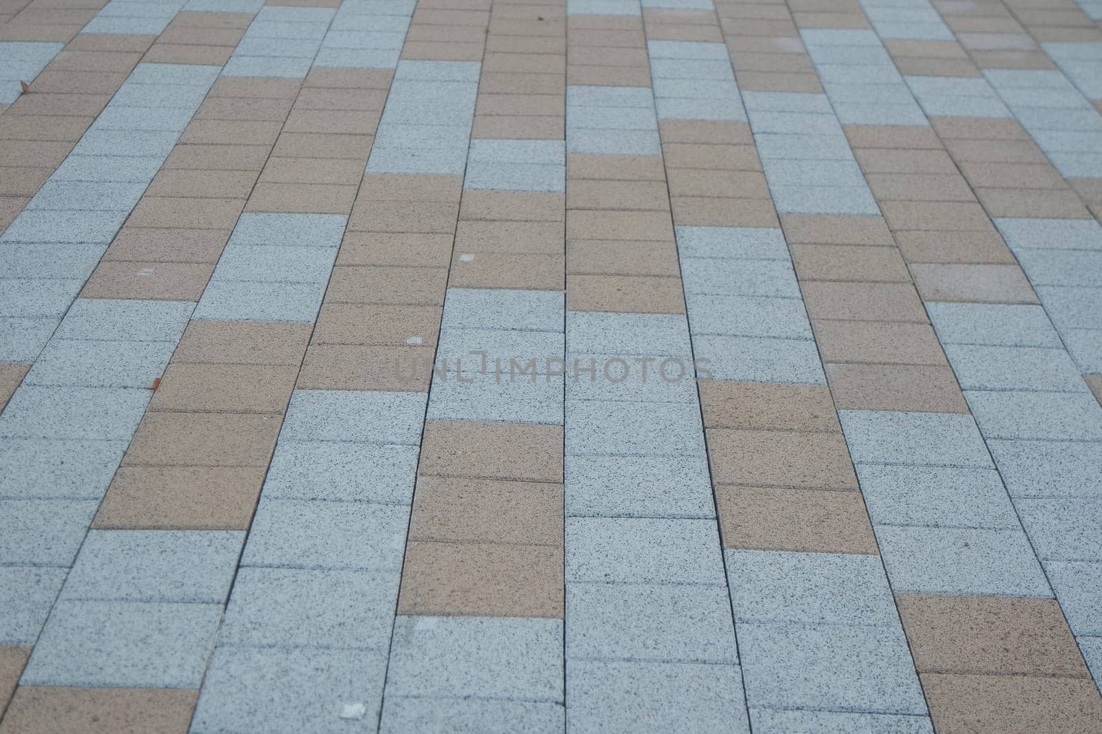 Closeup texture of brick floor. A background of a weathered old exterior brick floor with copy space for text