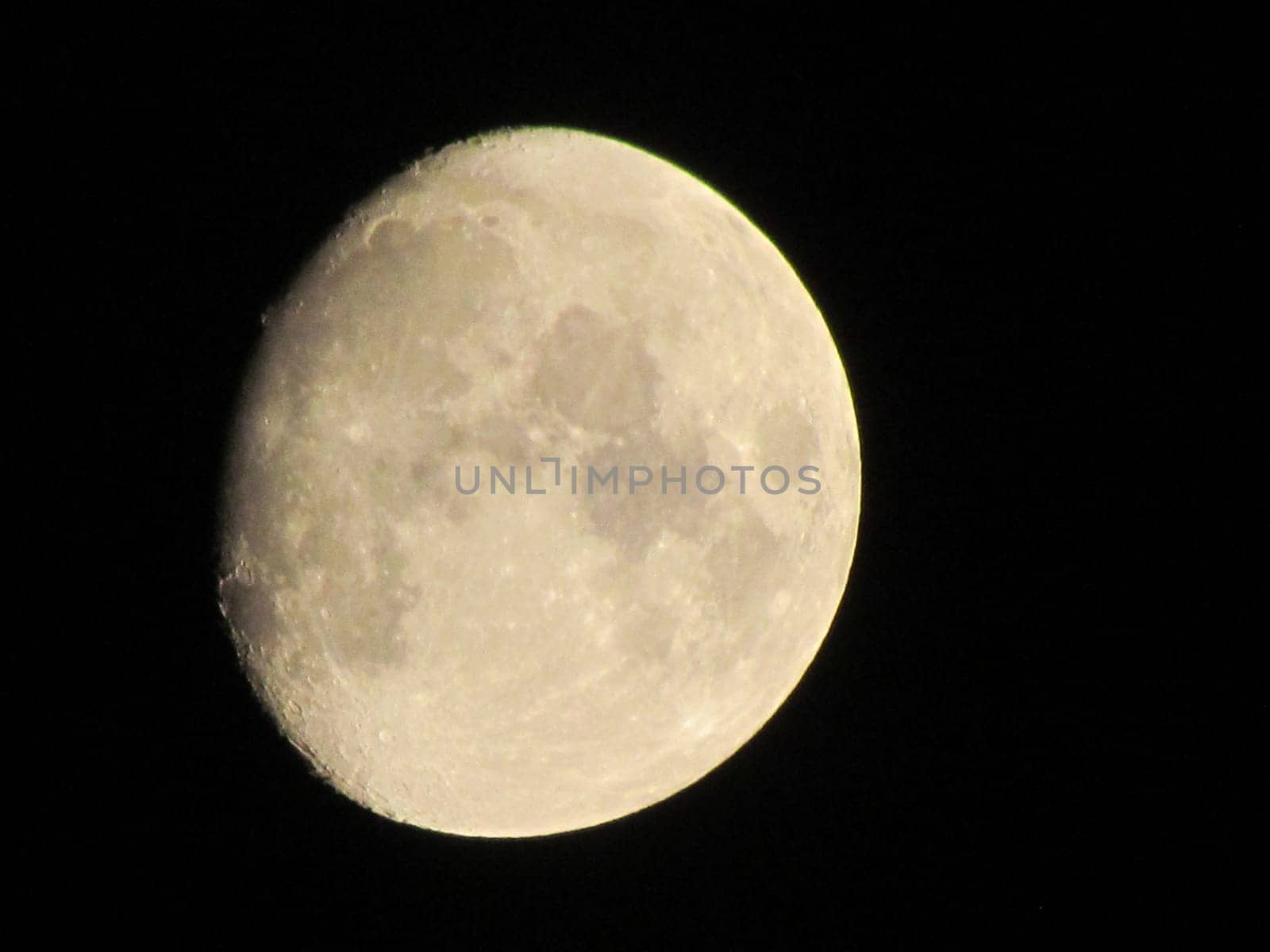 Earth moon glowing in black background at night. Half moon dark and half moon dark in black background.