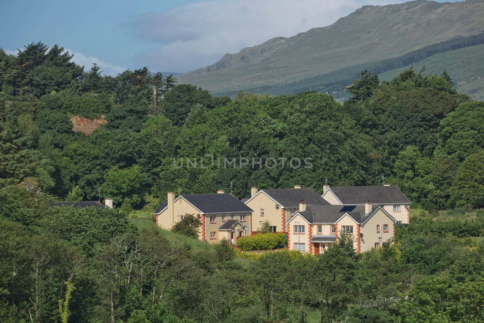 People enjoying living in beautiful landscape full of rock formations along the irish coastline near Killybegs, County Donegal in Ireland.