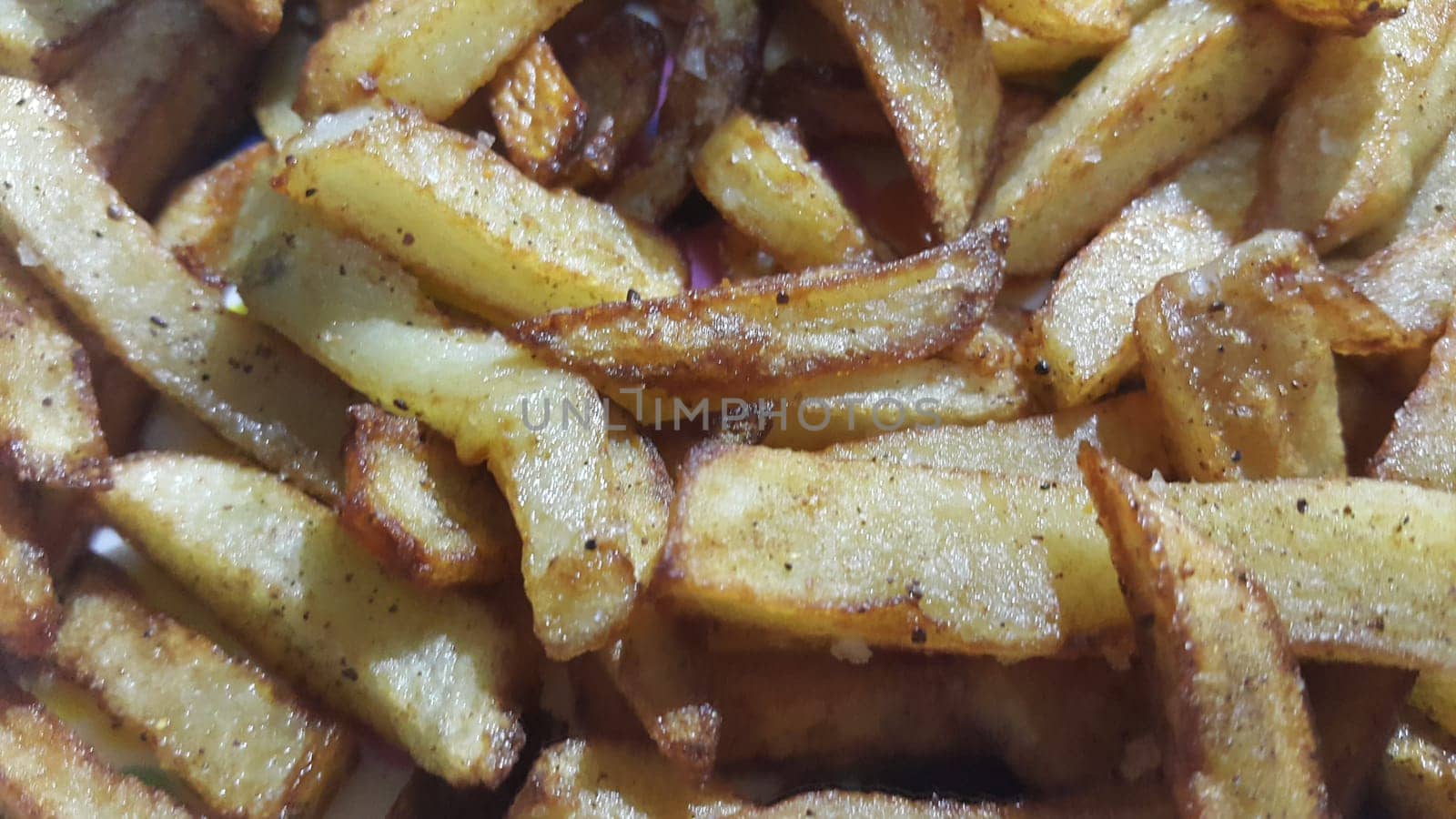 Potato fried or roasted slices on clean background with copy space for text