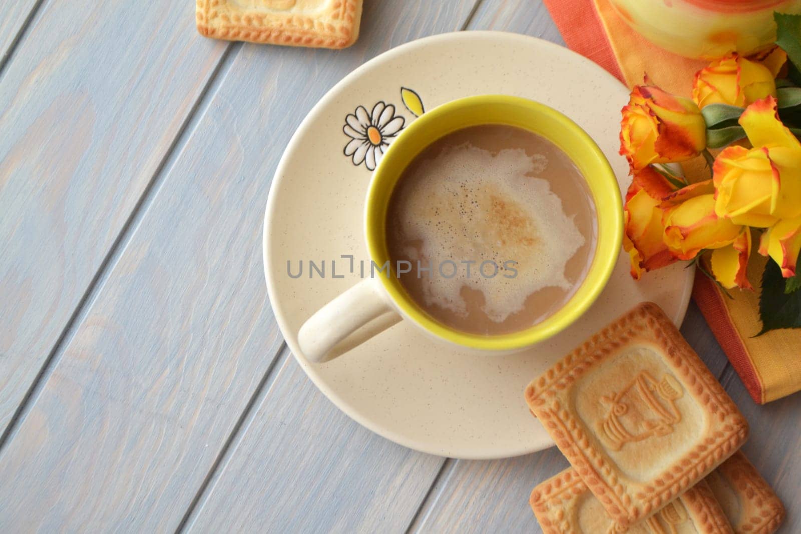 Coffee cup with spring flower and cookies in russian style with samovar notes good morning on blue rustic background, breakfast on Mothers day or Womens day. Top view