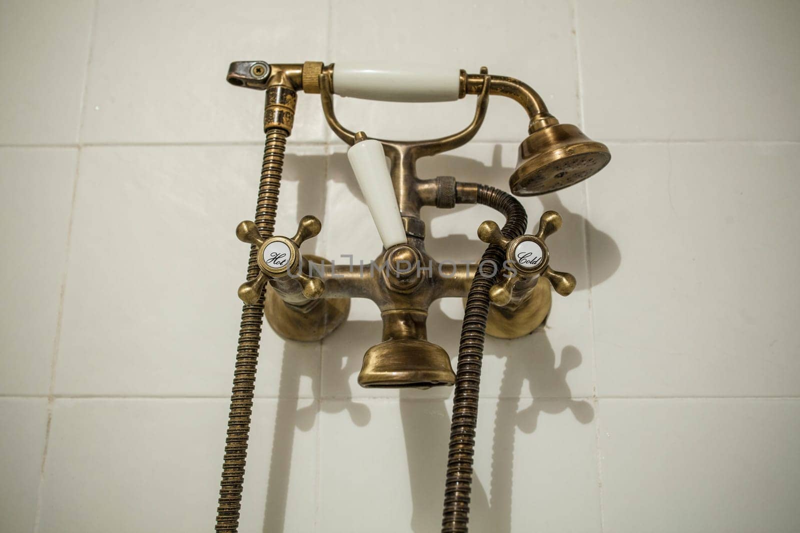 Antique Copper style bath tube faucet. Selective focus