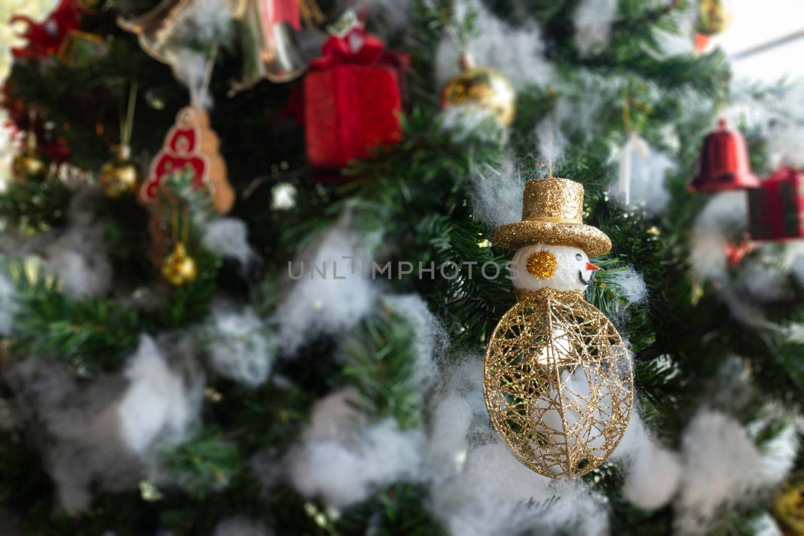 Christmas tree ornaments defocused lights background, stock photo