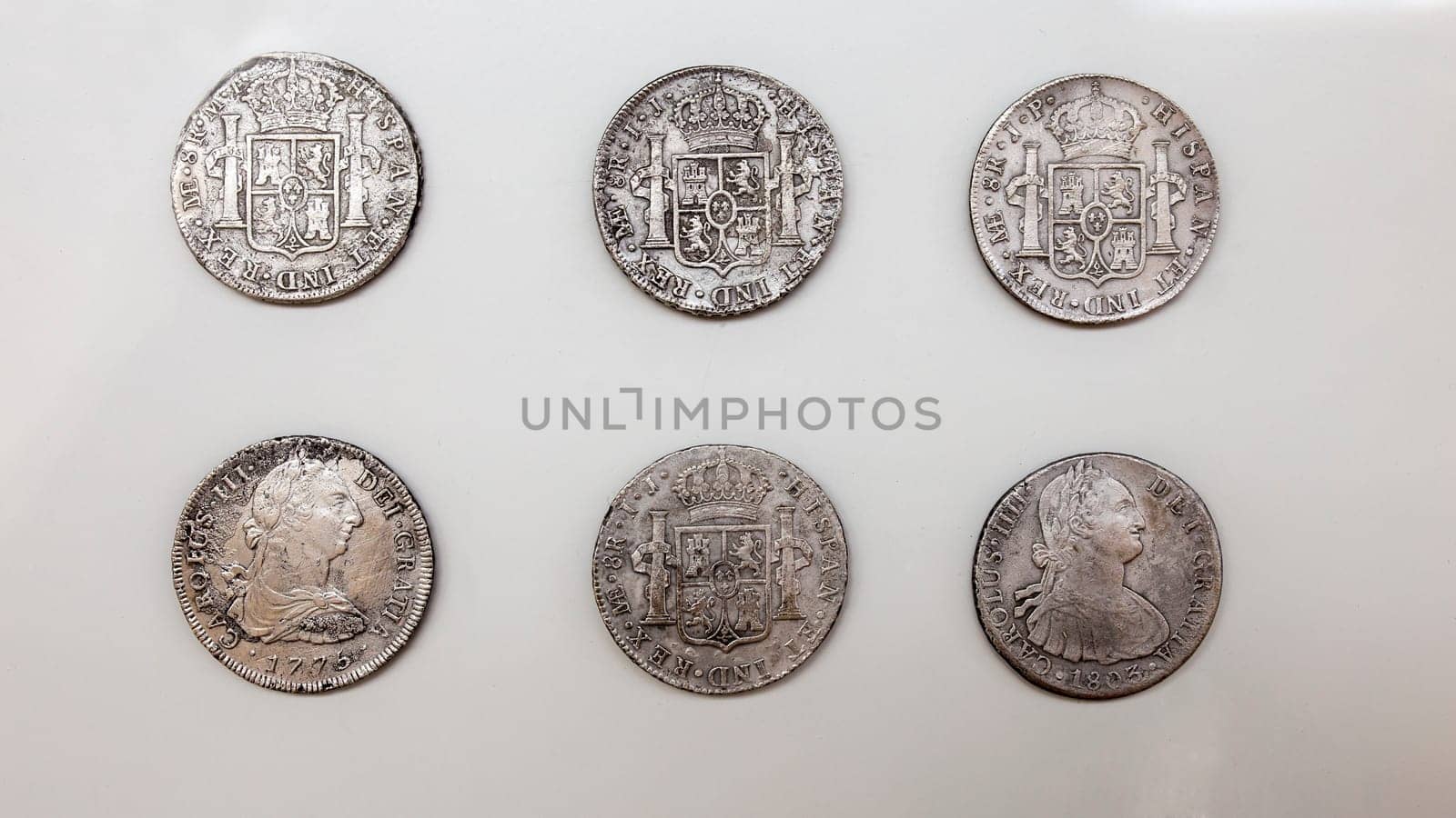Cartagena, Spain - September 14th, 2018: 6 Silver spanish pieces of eight. ARQUA Museum, Spain