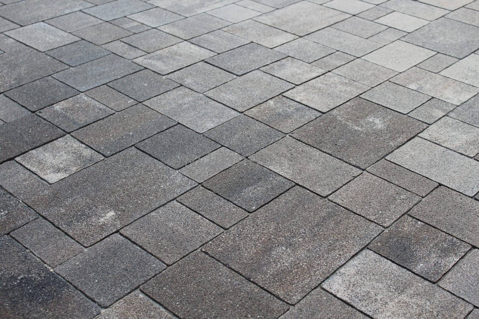 The background is the texture of the tile. The pattern and texture of the tile is construction.
