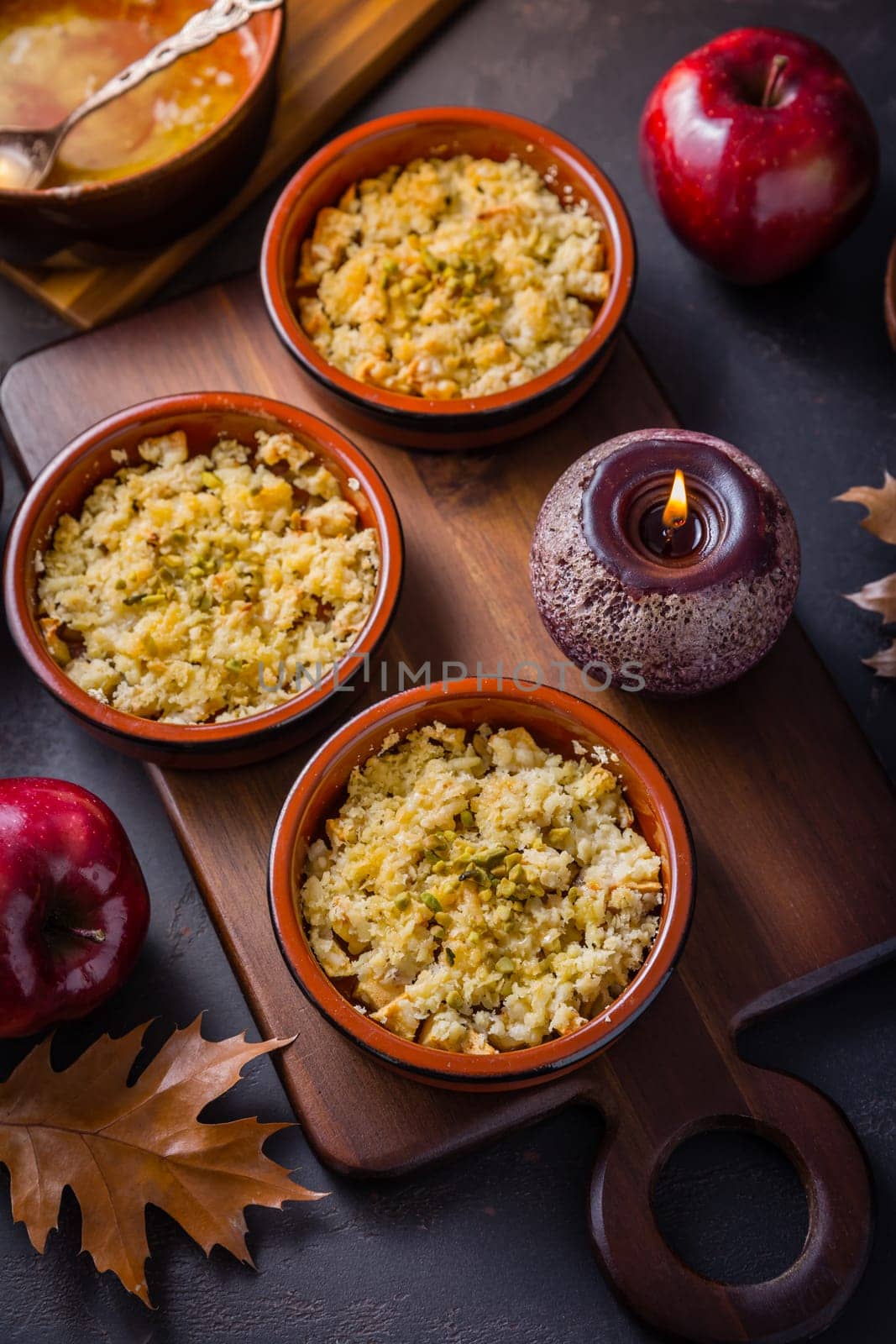 Small apple crumbles or apple pies for autumn and winter
