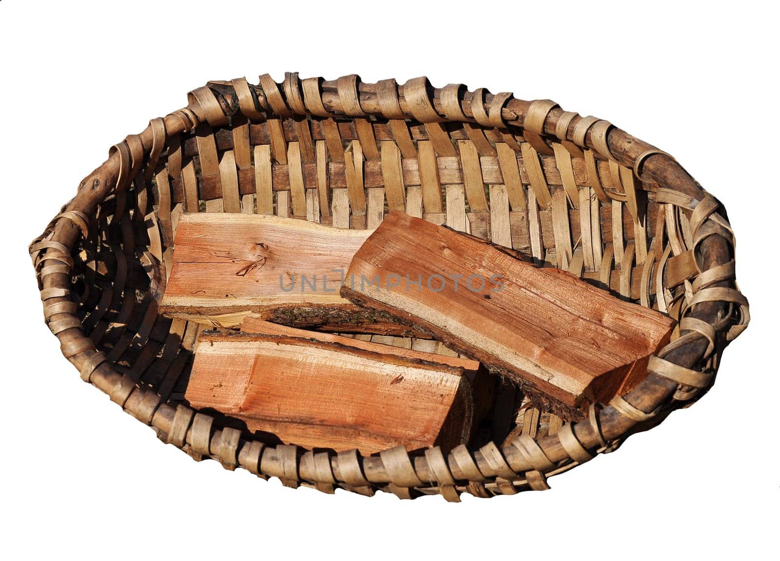 Old frame basket with firewood isolated on white