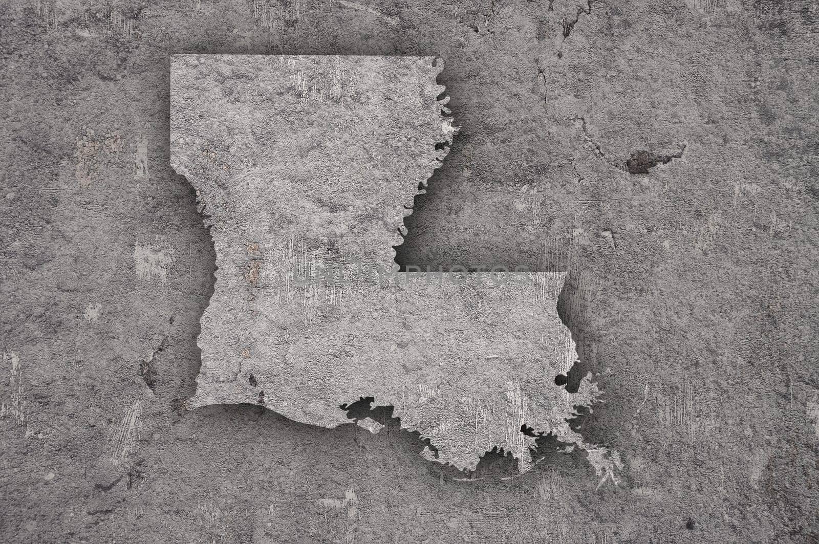 Map of Louisiana on weathered concrete