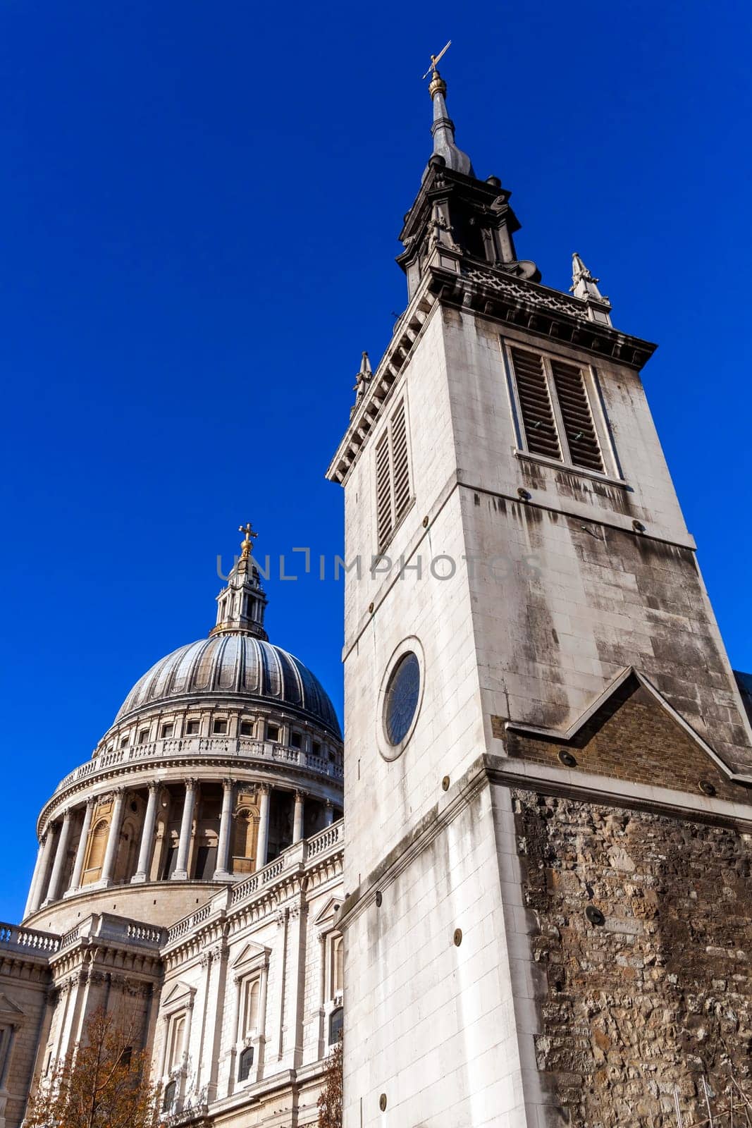 St Augustine With St Faith Church next to St Paul's Cathedral in London England UK rebuilt in 1680 by Sir Christopher Wren which is a popular tourist travel destination attraction landmark