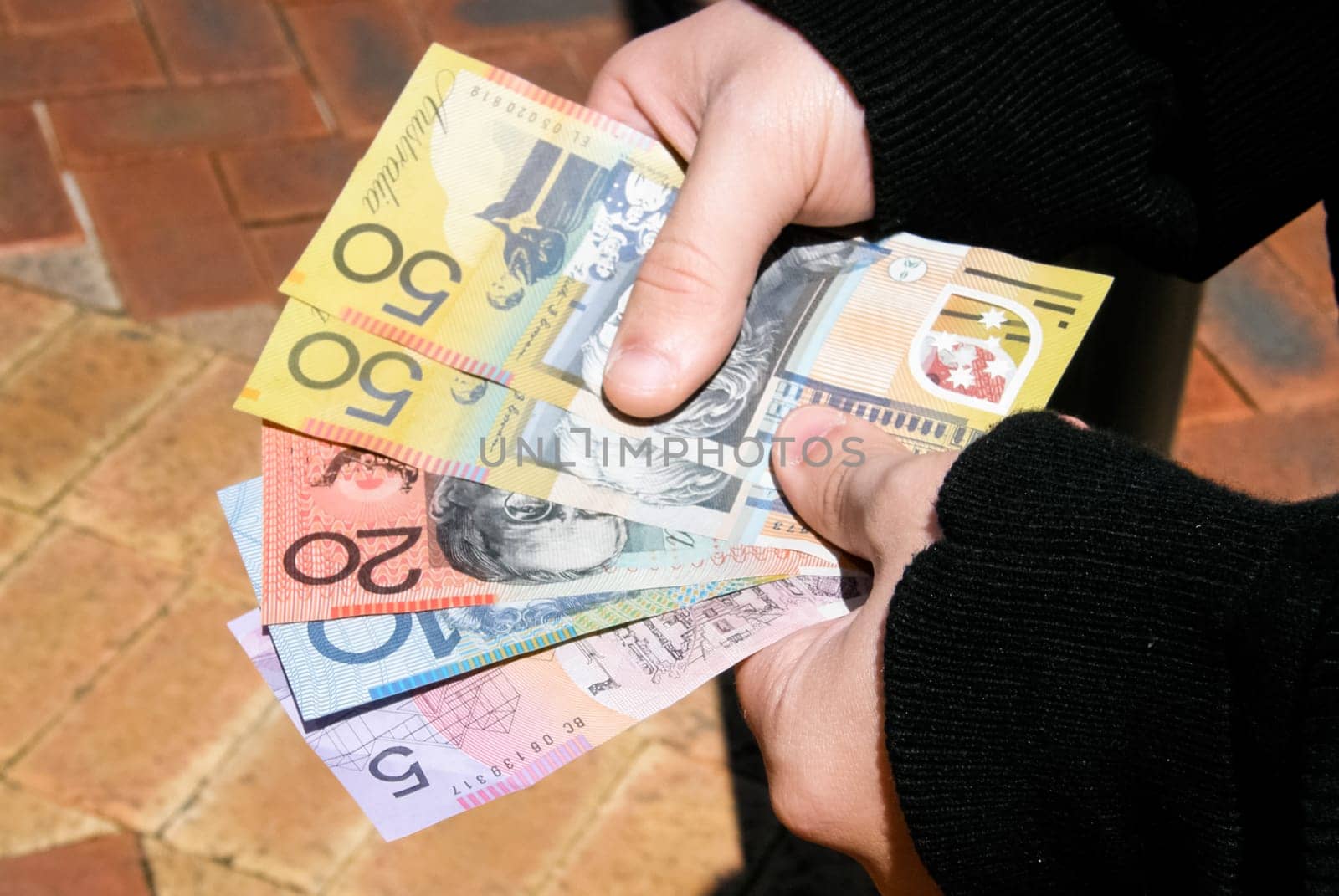 A pack of euros in the hands of a man. recalculation of money