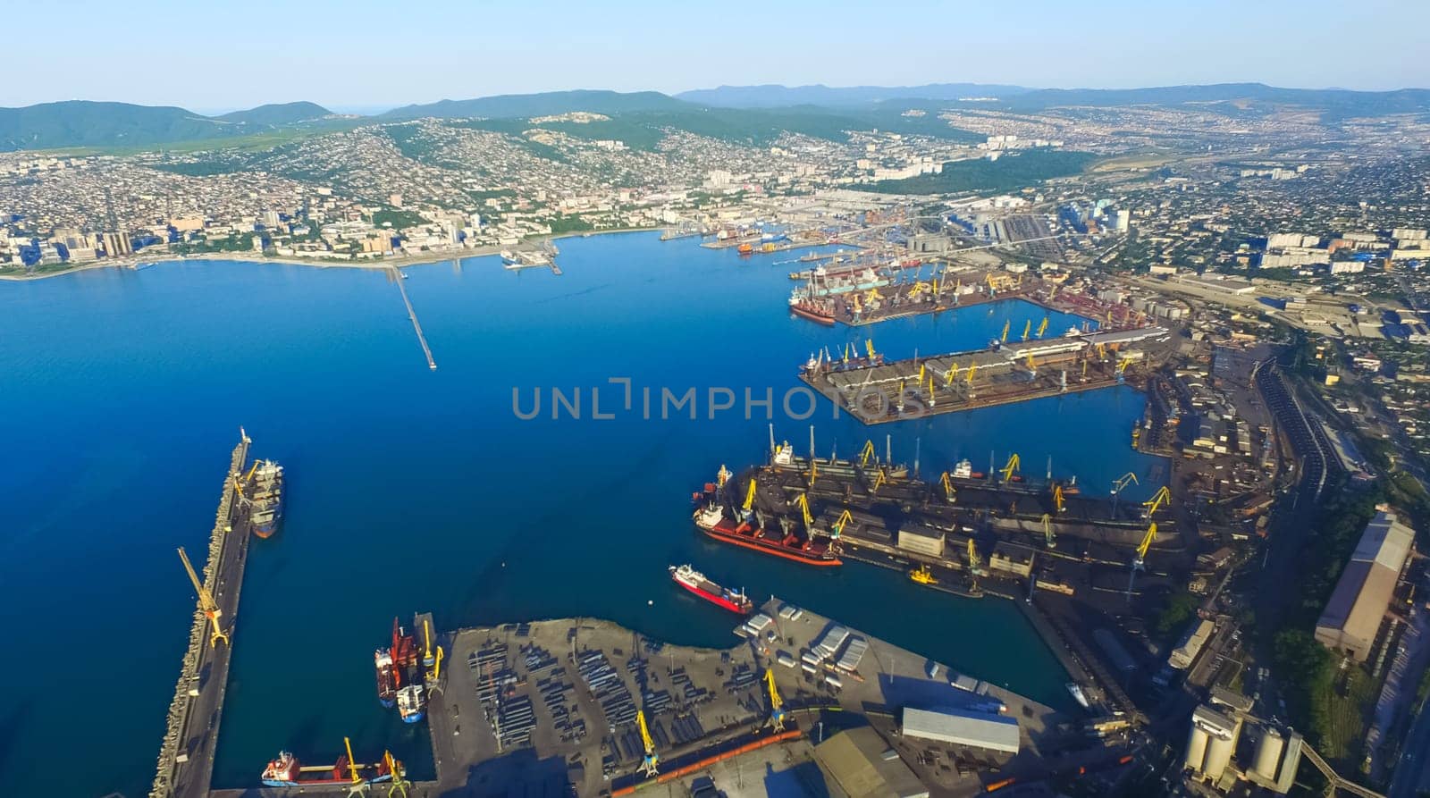 Industrial seaport in the bay view from above.
