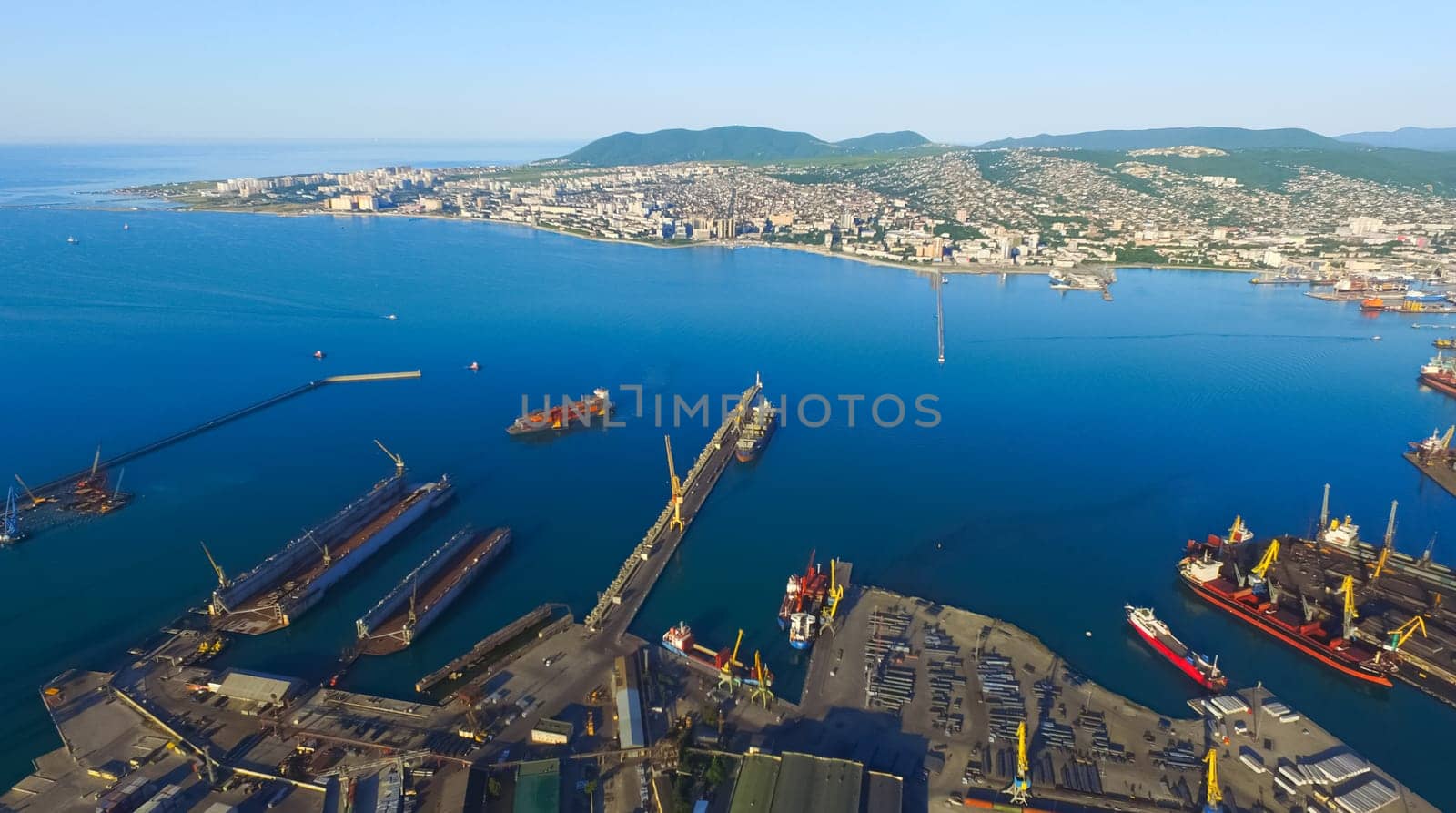 Industrial seaport in the bay view from above.