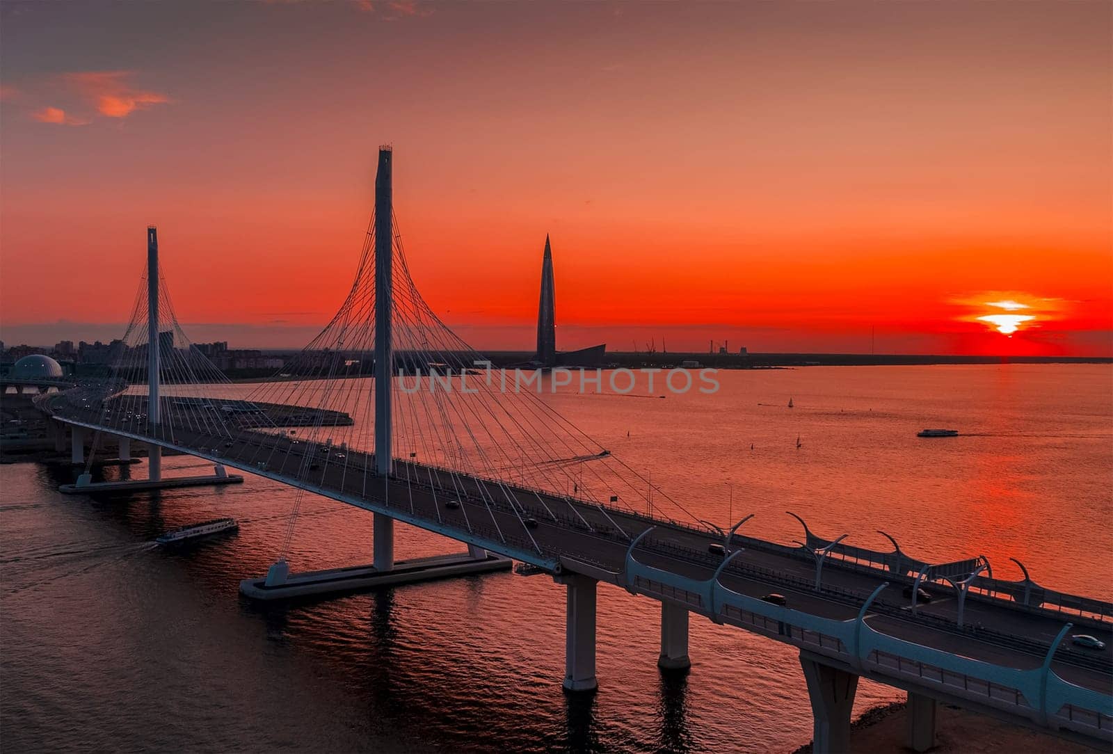 A bridge across the river. A large bridge in St. Petersburg.