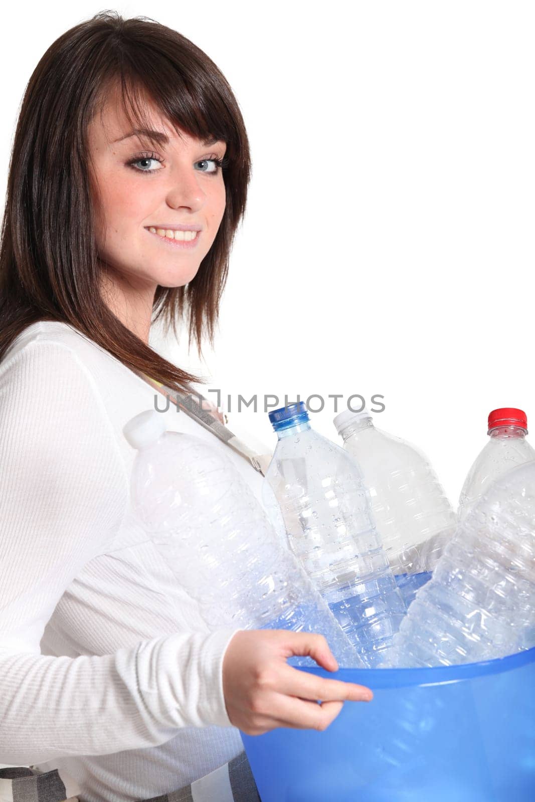 Girl taking the recycling out