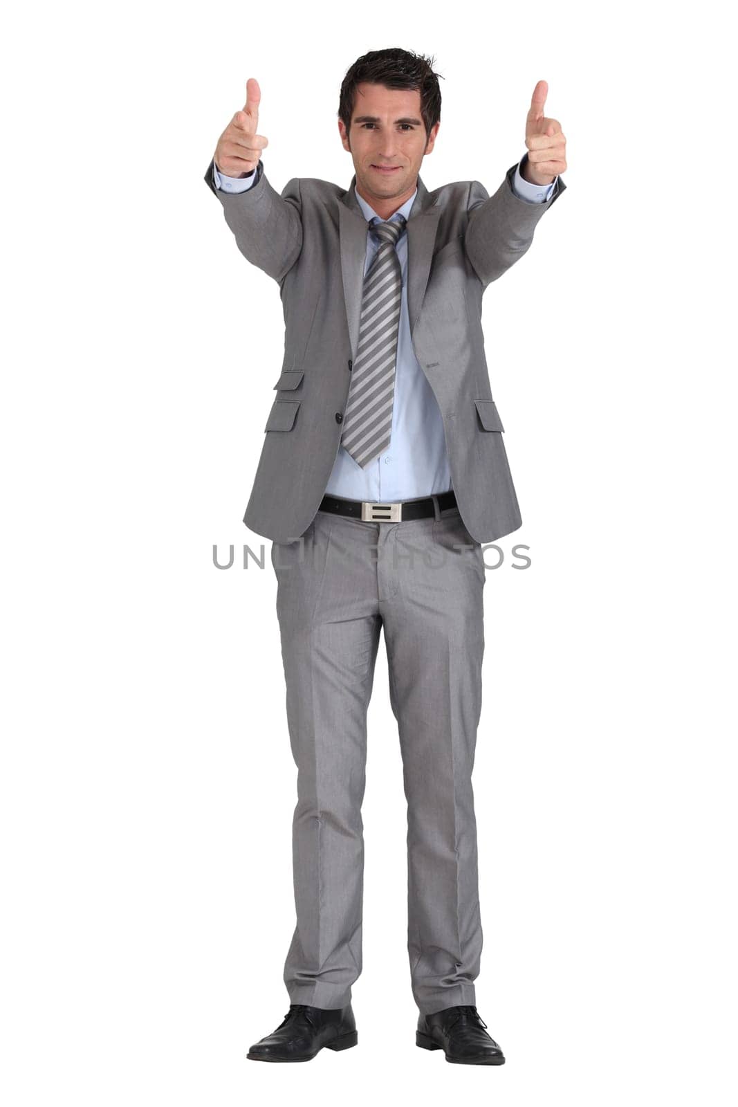 Businessman shooting with fingers